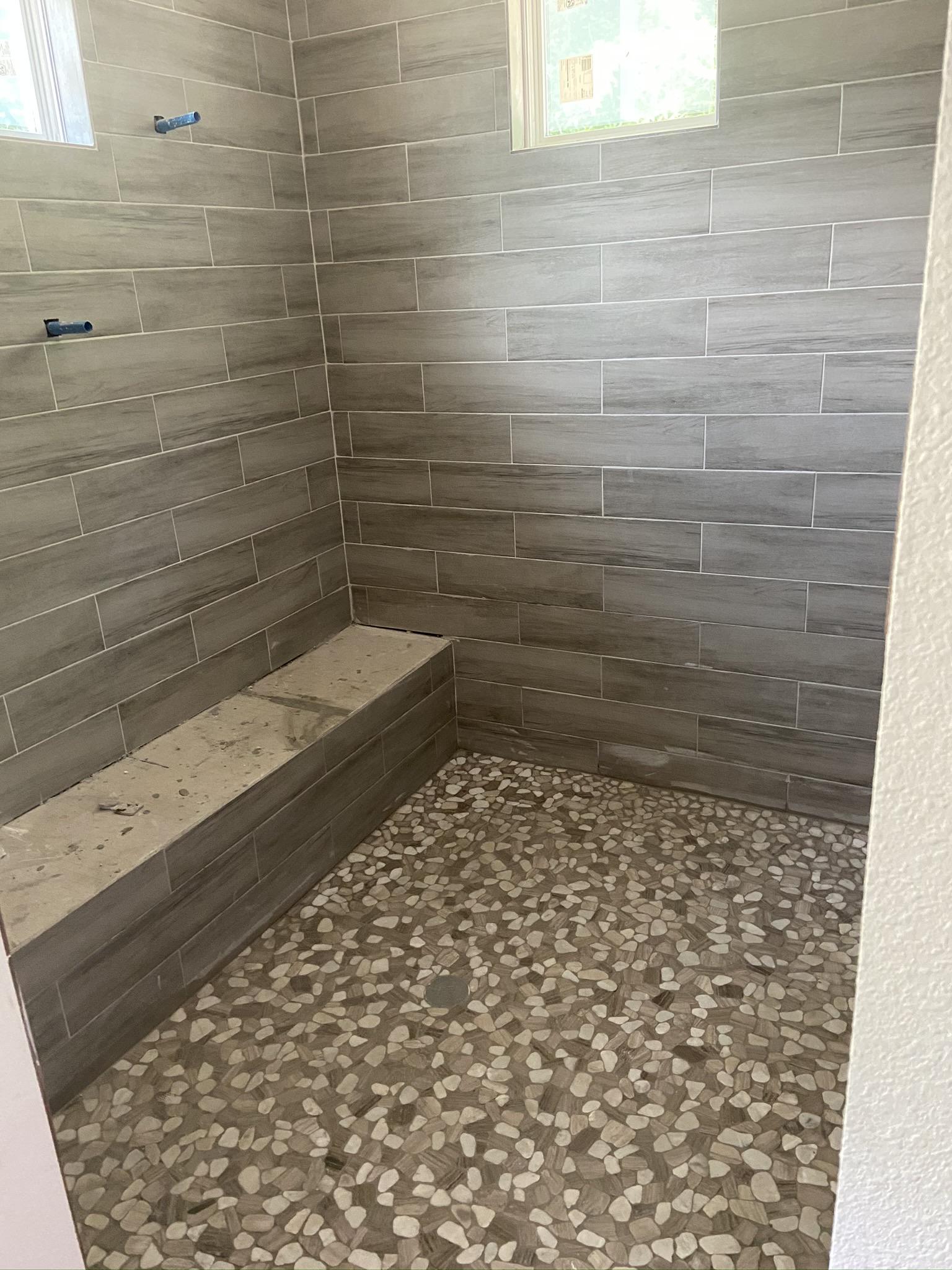 A shower I just completed. Counter top guys will be installing a piece