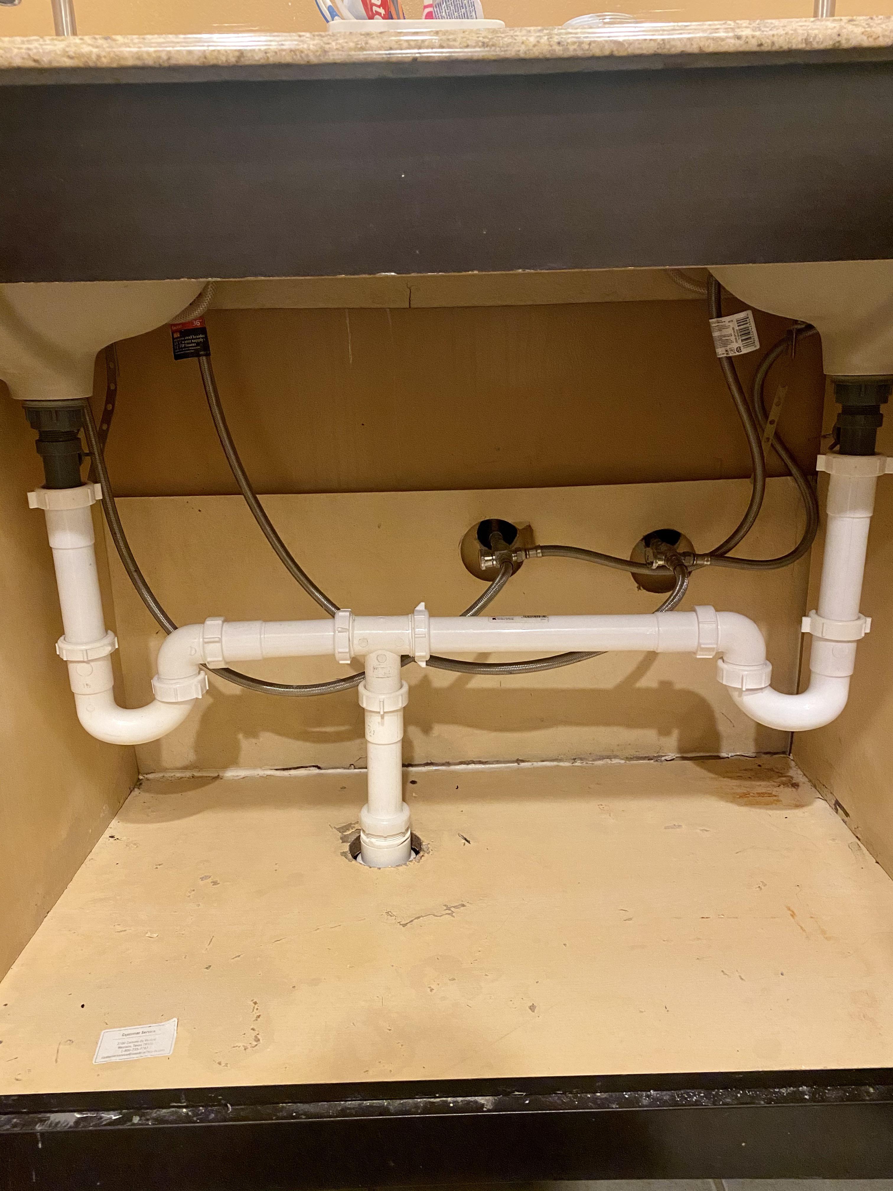 Does this look legit? Both of the sink drains had wonky straps & I