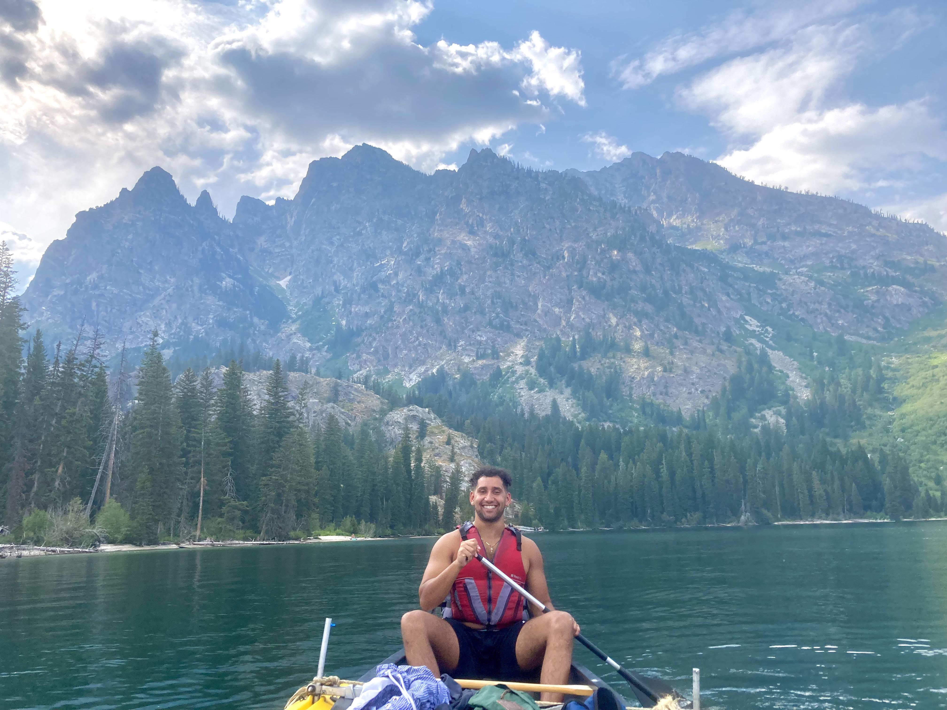 My buddy Canoeing Jenny Lake in the Tetons r/NationalPark