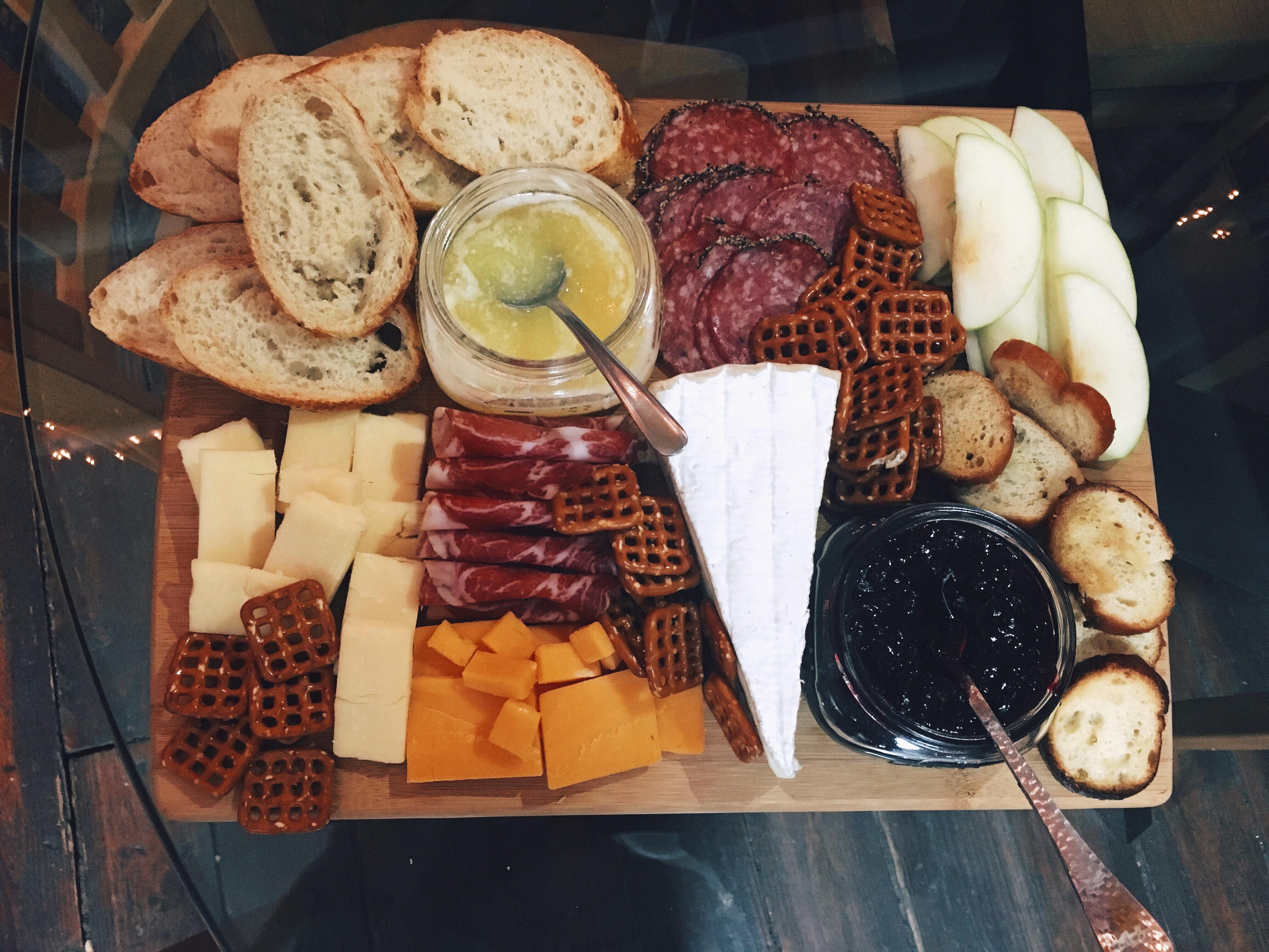 [Homemade] meat & cheese board with mixed berry jam and wildflower