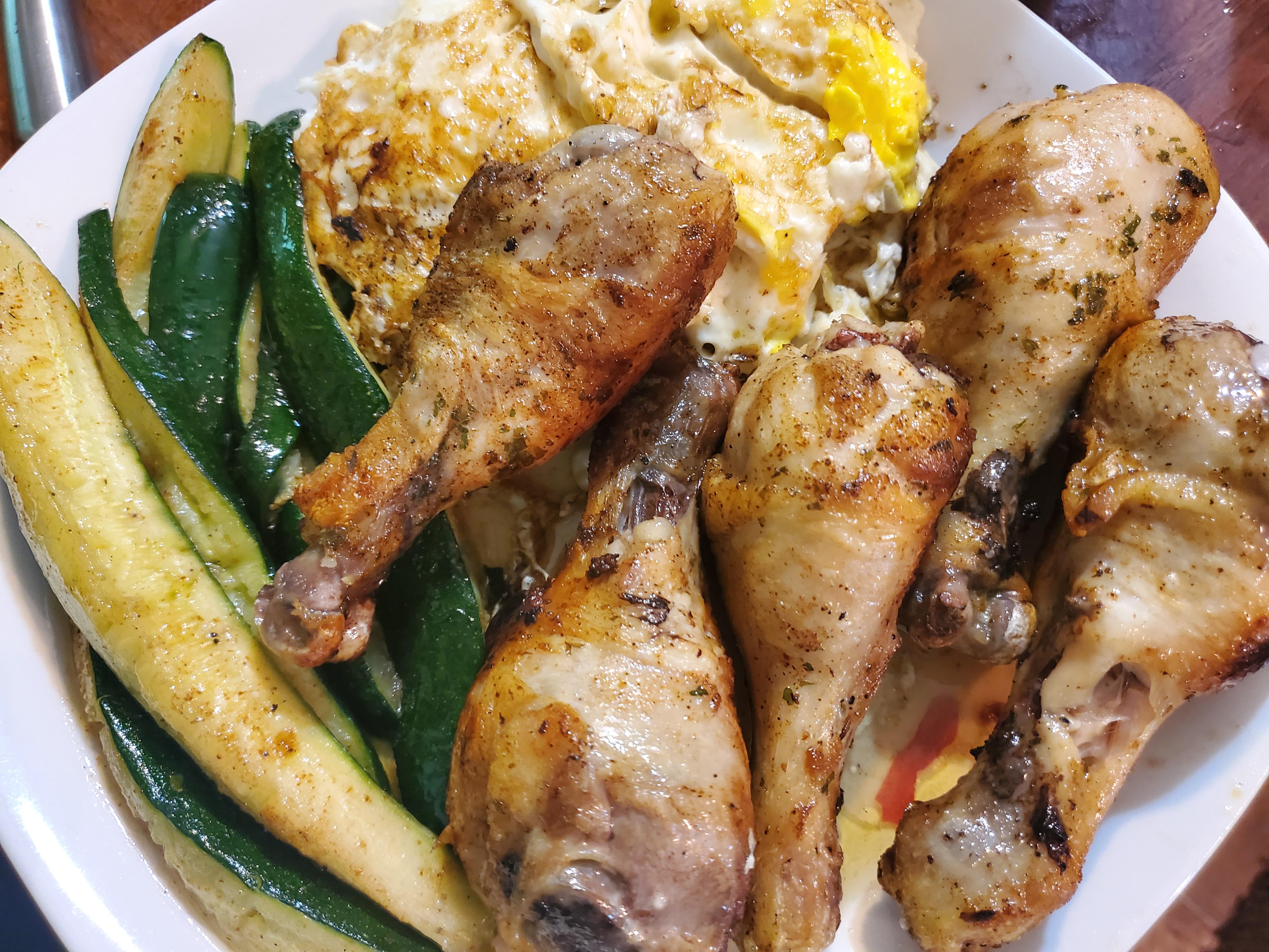 Chicken drumsticks, zucchini and eggs, cooked in my grandma's cast iron