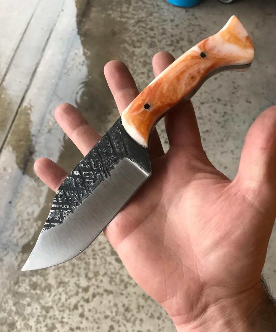 New one I just finished. Hand leaf spring with ivory and gold