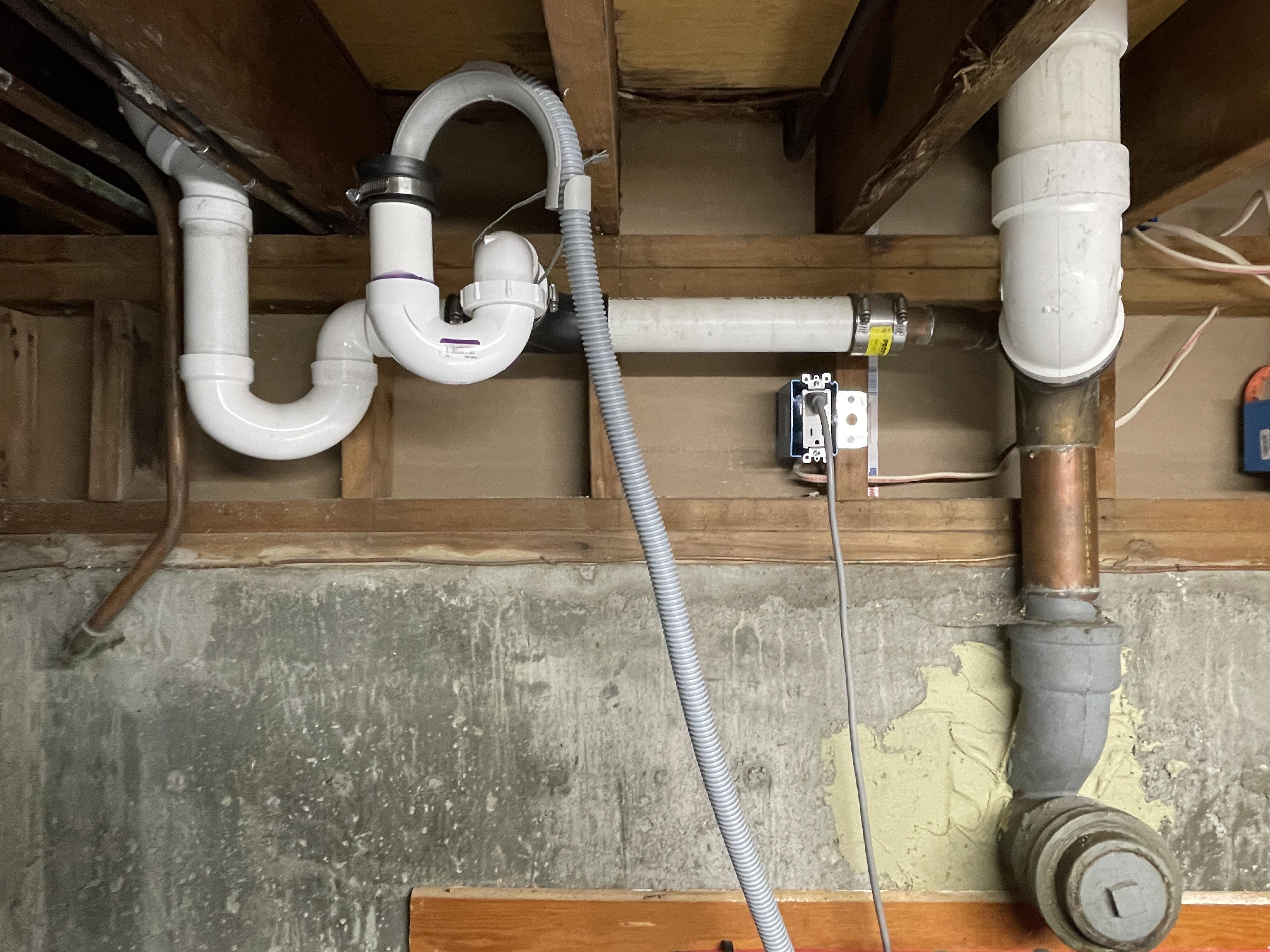 Stand pipe for drain hose constantly leaking out suds from washing