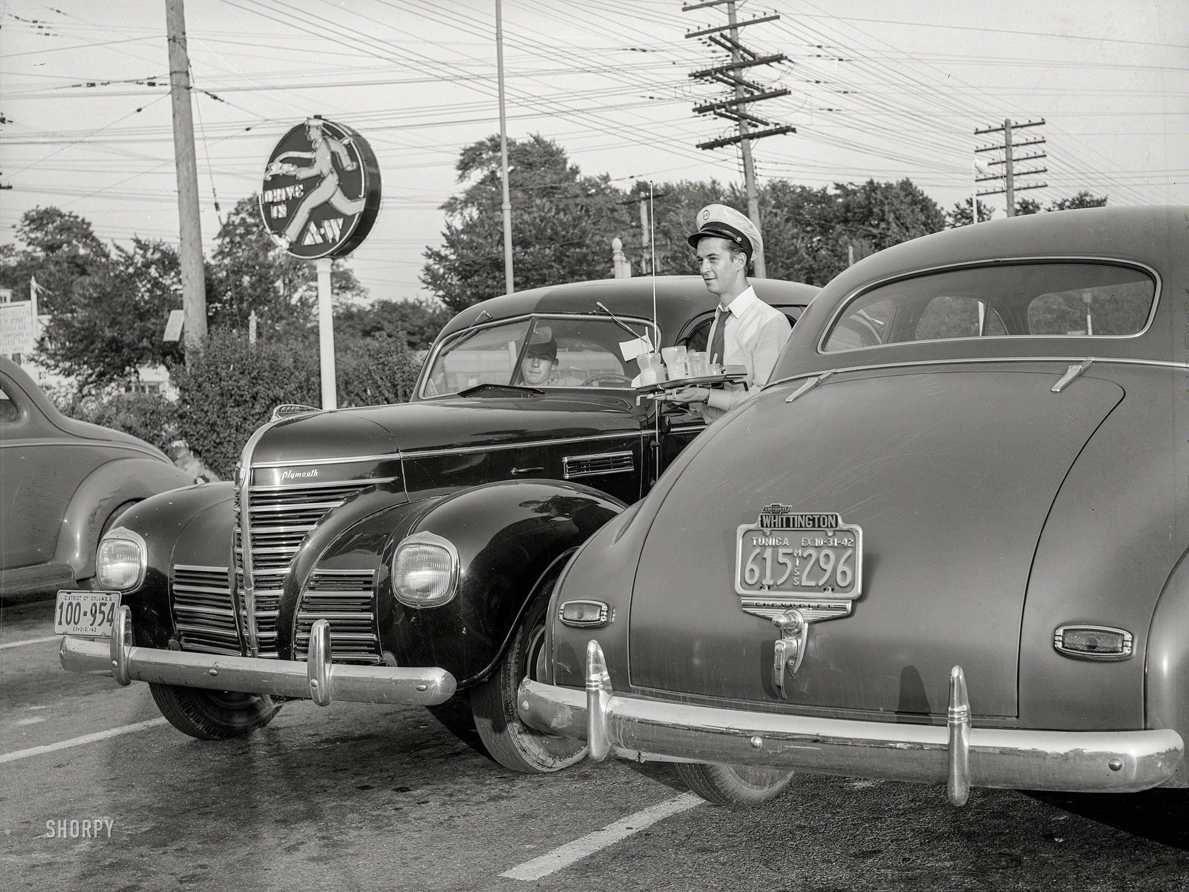 Chevy Chase, Maryland. Serving supper to motorists at an A&W Hot