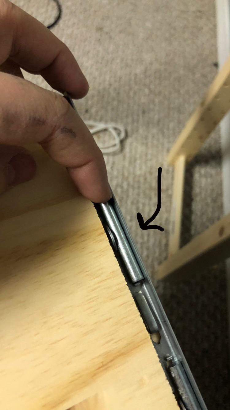 How do I get this little metal dowel but out of here, it’s one of the