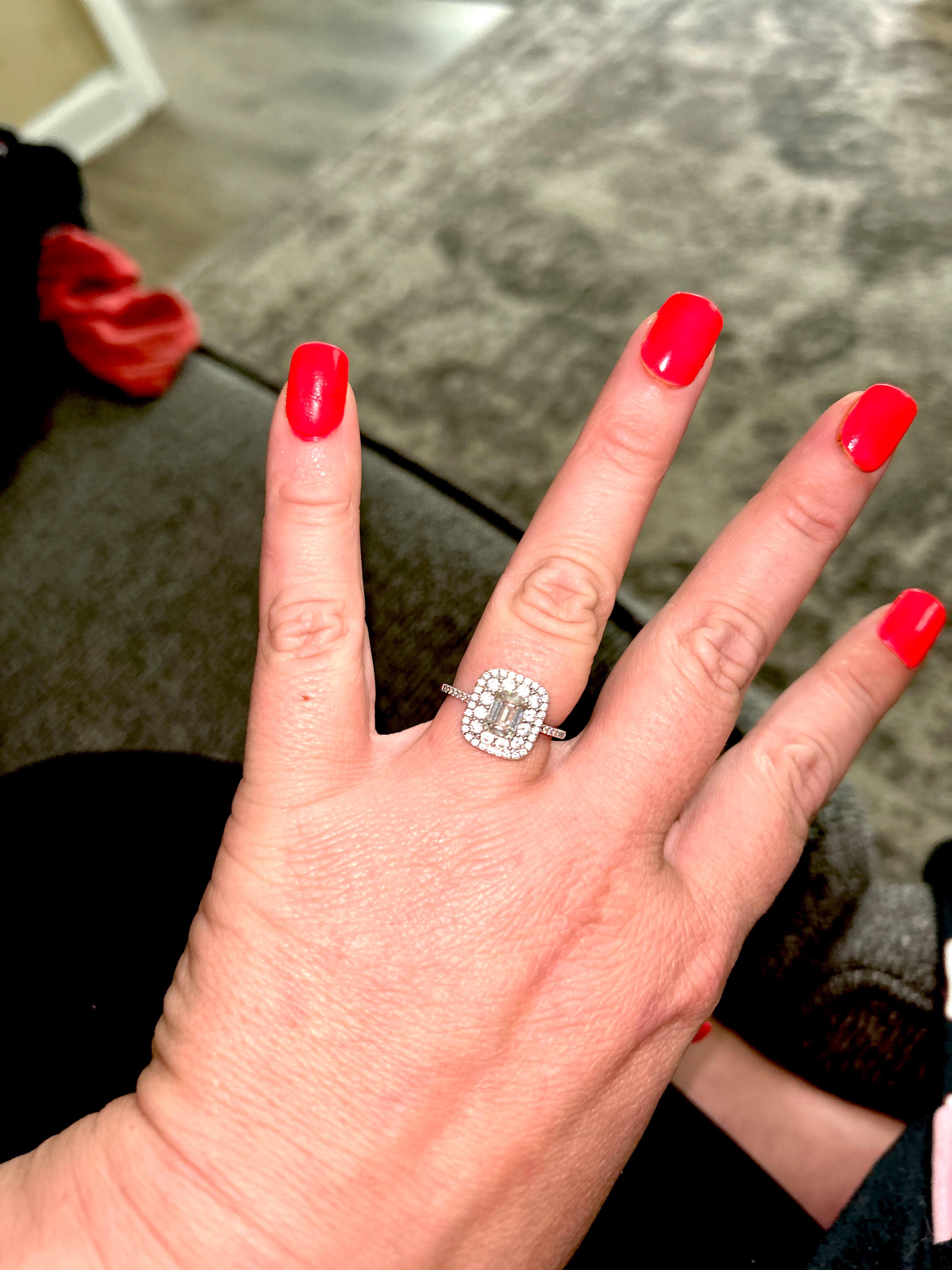 1.75 carat emerald cut and round stones . Engagement ring. 18k white