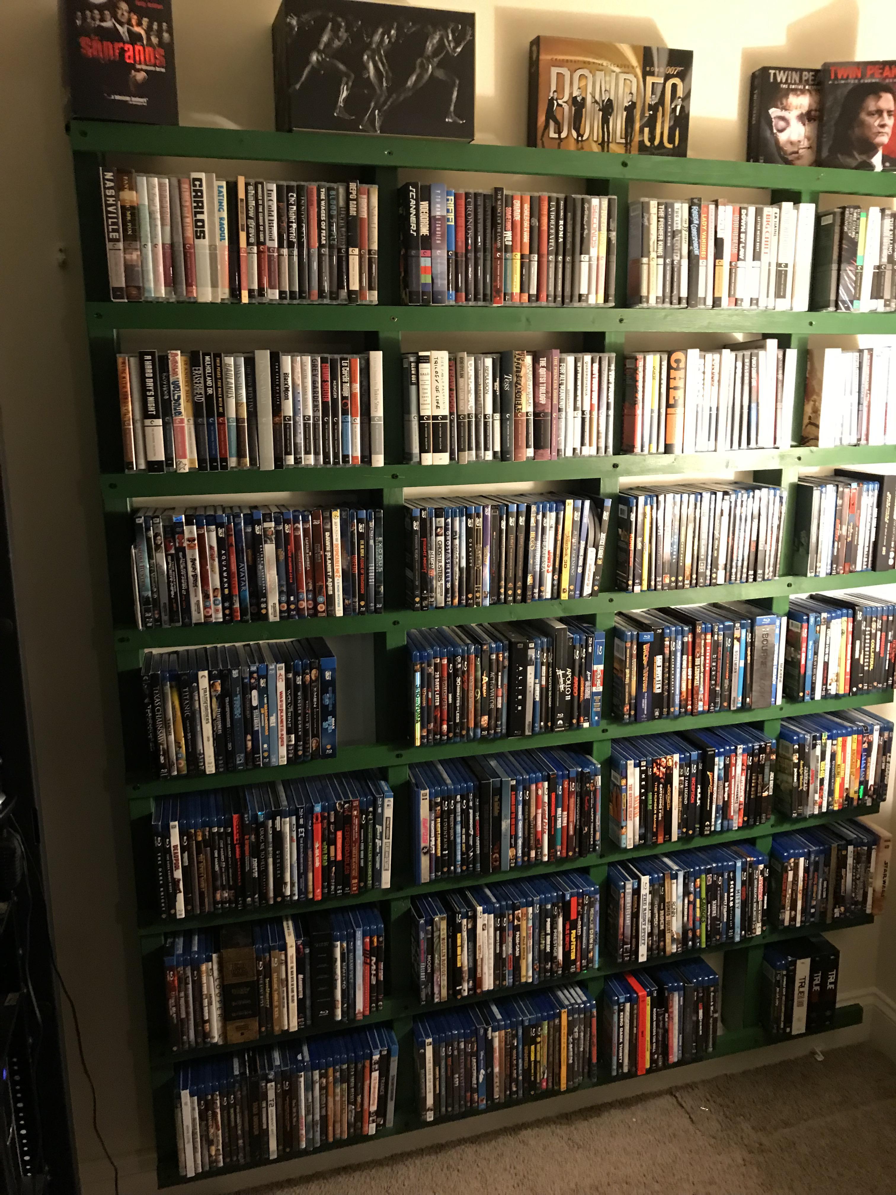 Just finished building the custom movie rack. So happy with how it