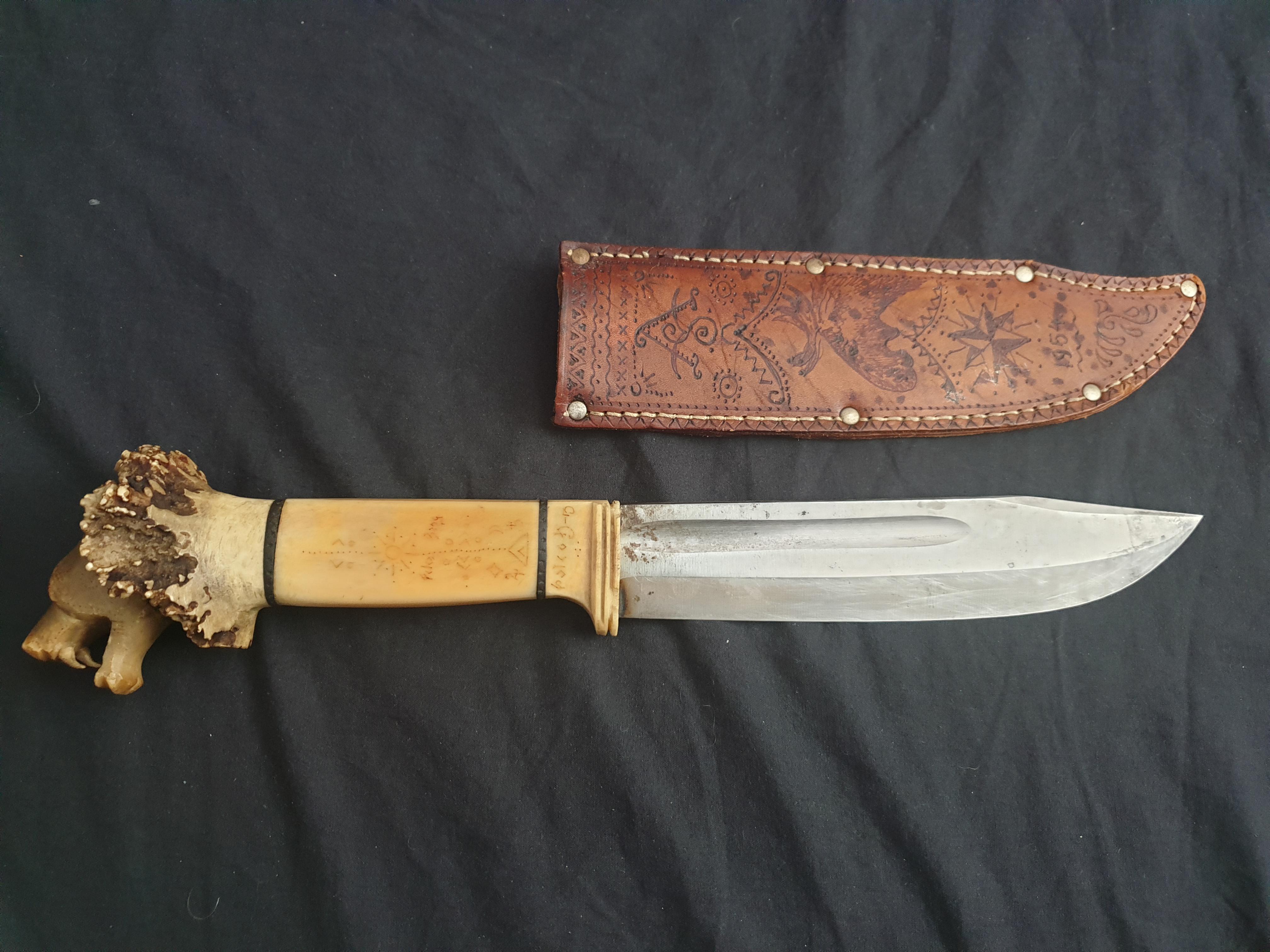 Got this antique 1950s knife with a handle made of elk antlers from my