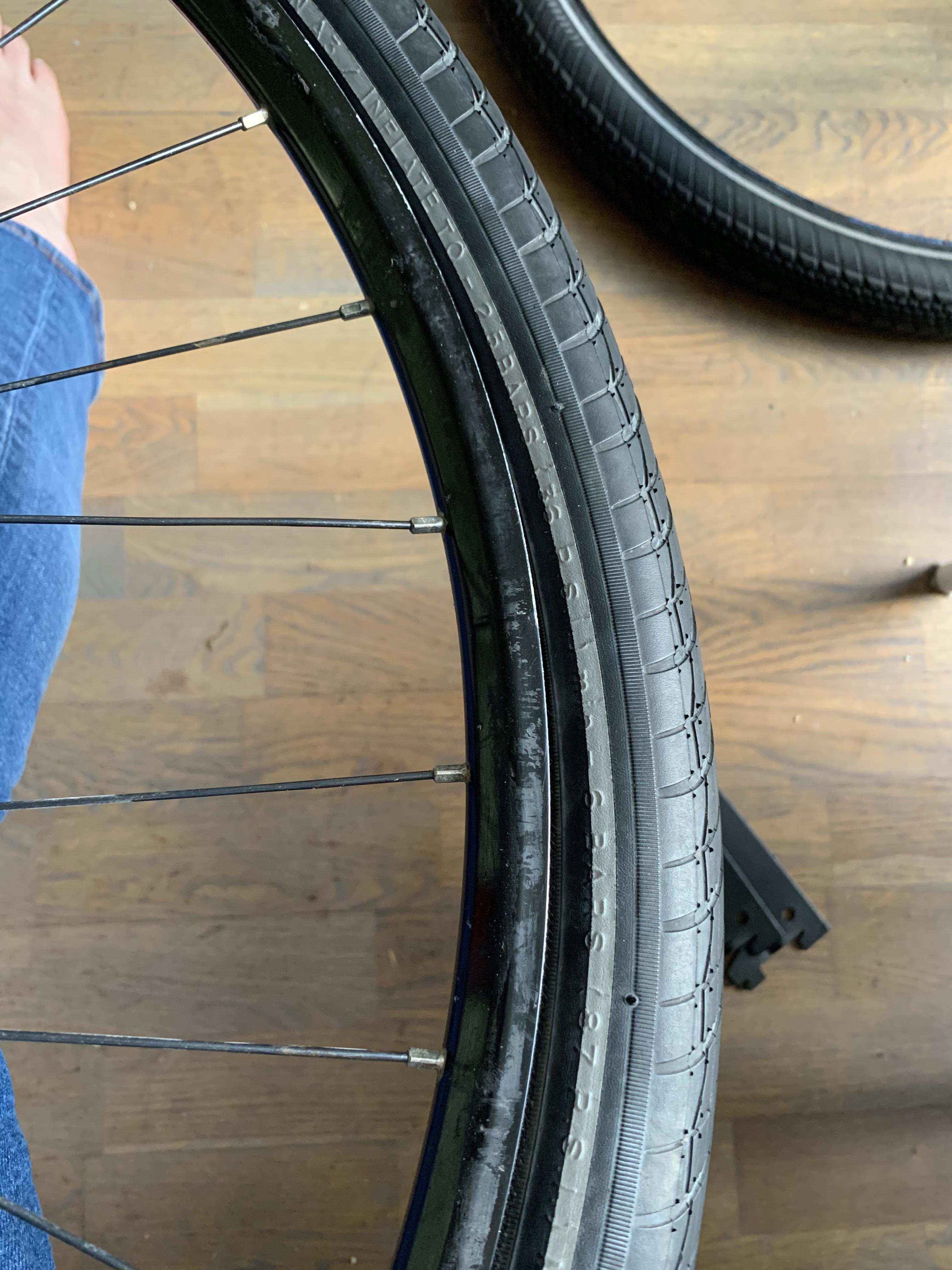 How to get the tire on symmetrically? It keeps bulging on one side no