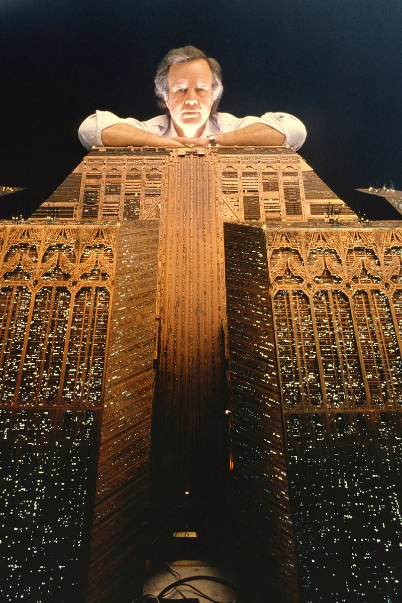 Special Effects Director Douglas Trumbull poses behind the model of the