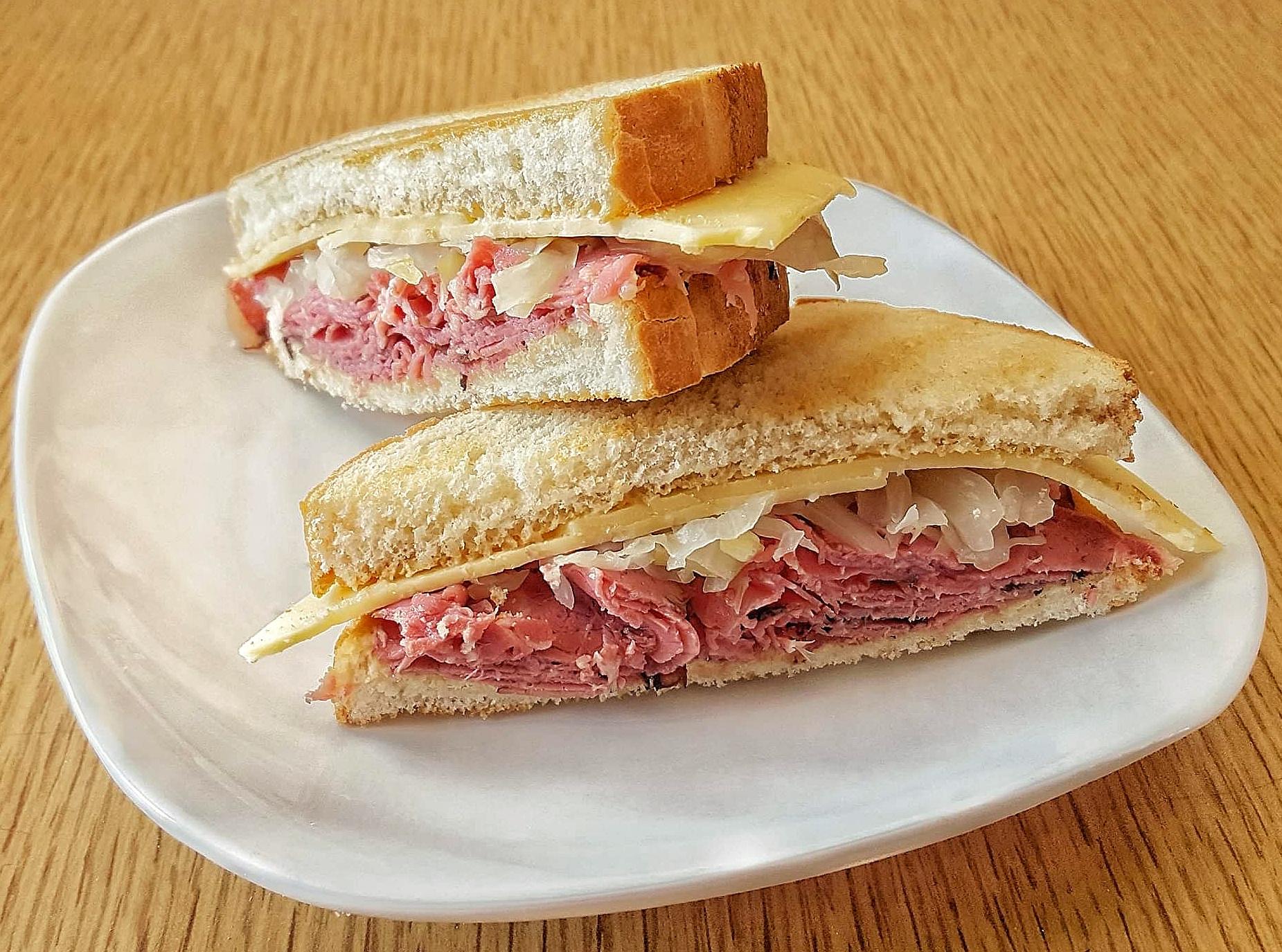 Pastrami on Italian bread with smoked gouda, horseradishdijon mustard