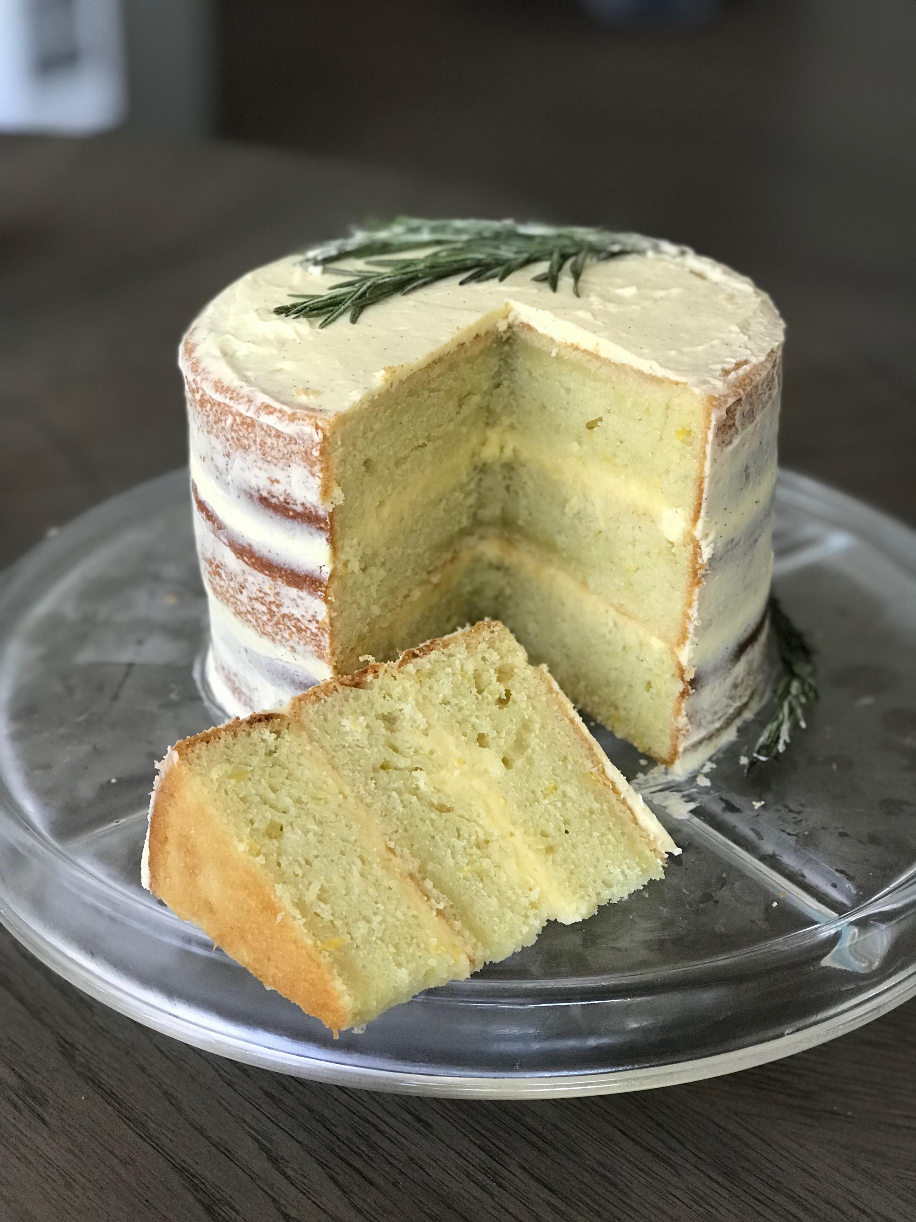 Lemon olive oil cake brushed with rosemary honey syrup, filled with