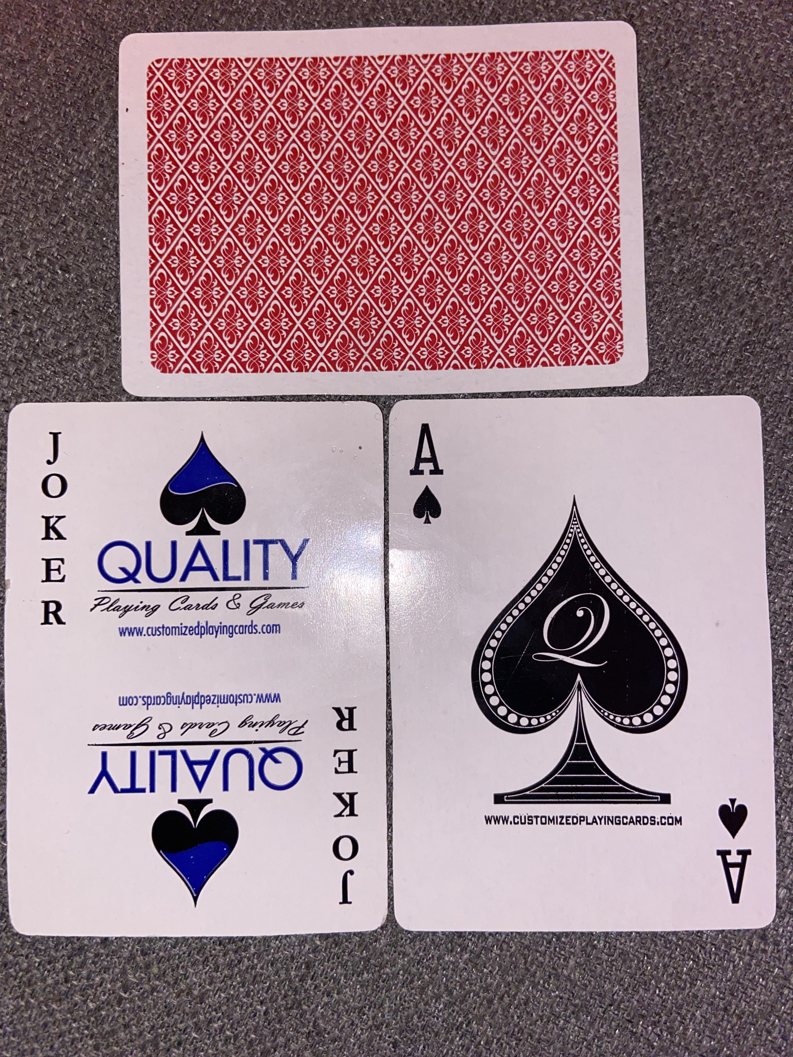 Can anyone help me identify these playing cards? I got them as a gift and I really like the back