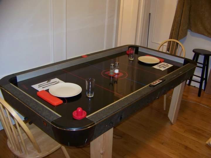 Air hockey table repurposed as dining table r/mildlyinteresting