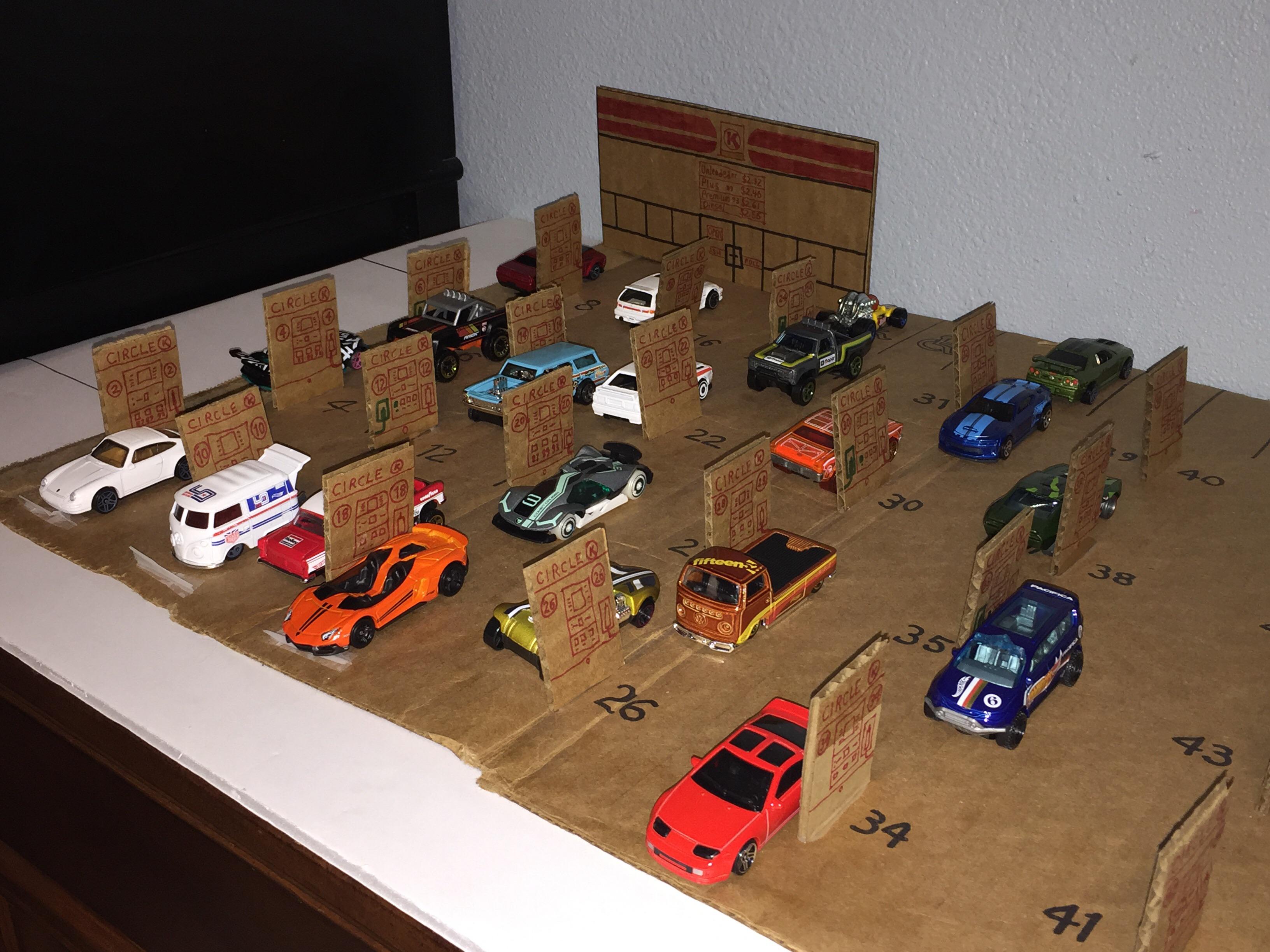 Decided to make a gas station out of an old cardboard box. Looks like