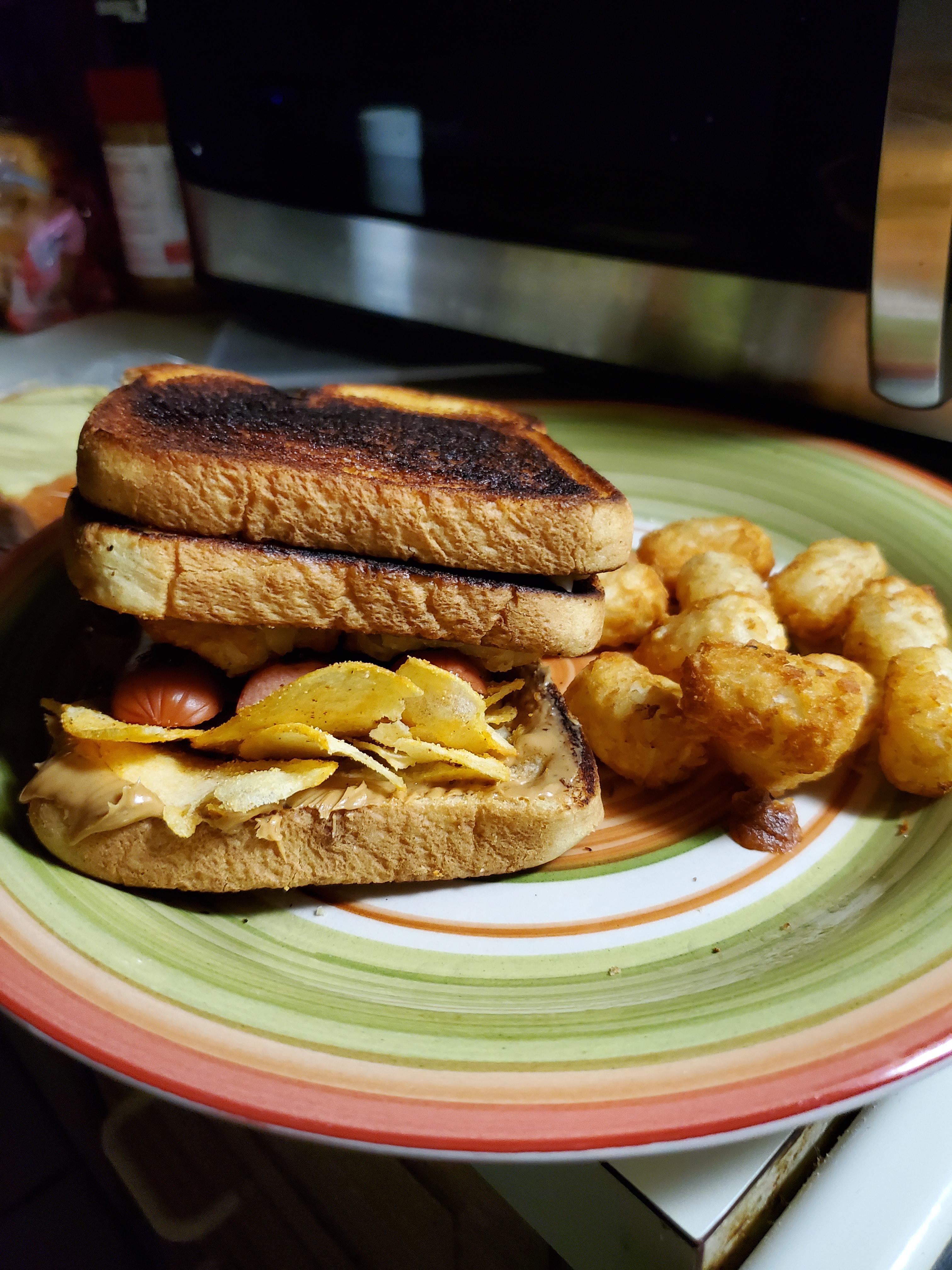 Top layer 5 cheese grilled cheese with mac and cheese. Bottom layer