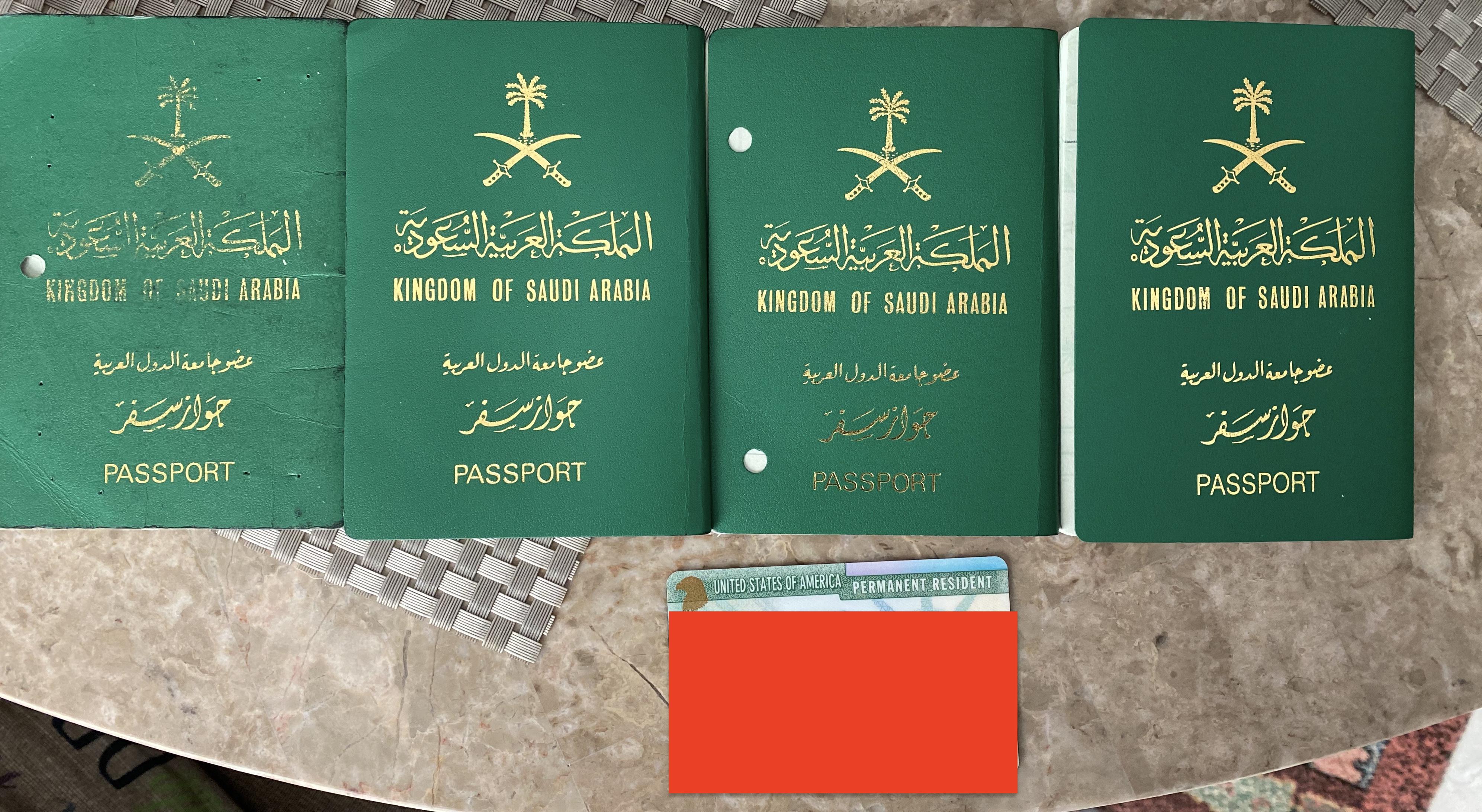 Four Saudi passports (the newest of which is on the far right) and a
