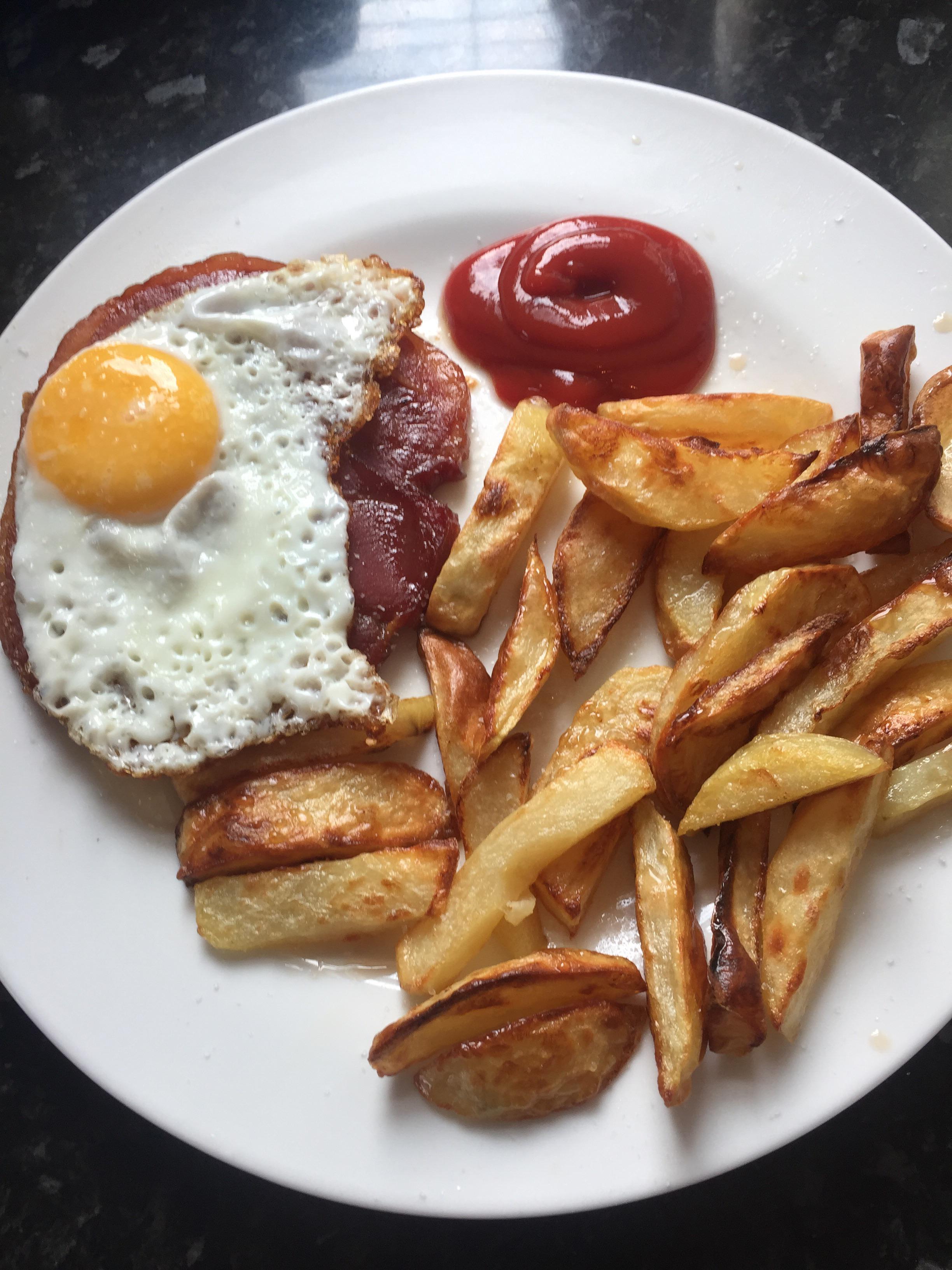 Slow cooked smoked gammon, homemade oven cooked chips and fried egg r