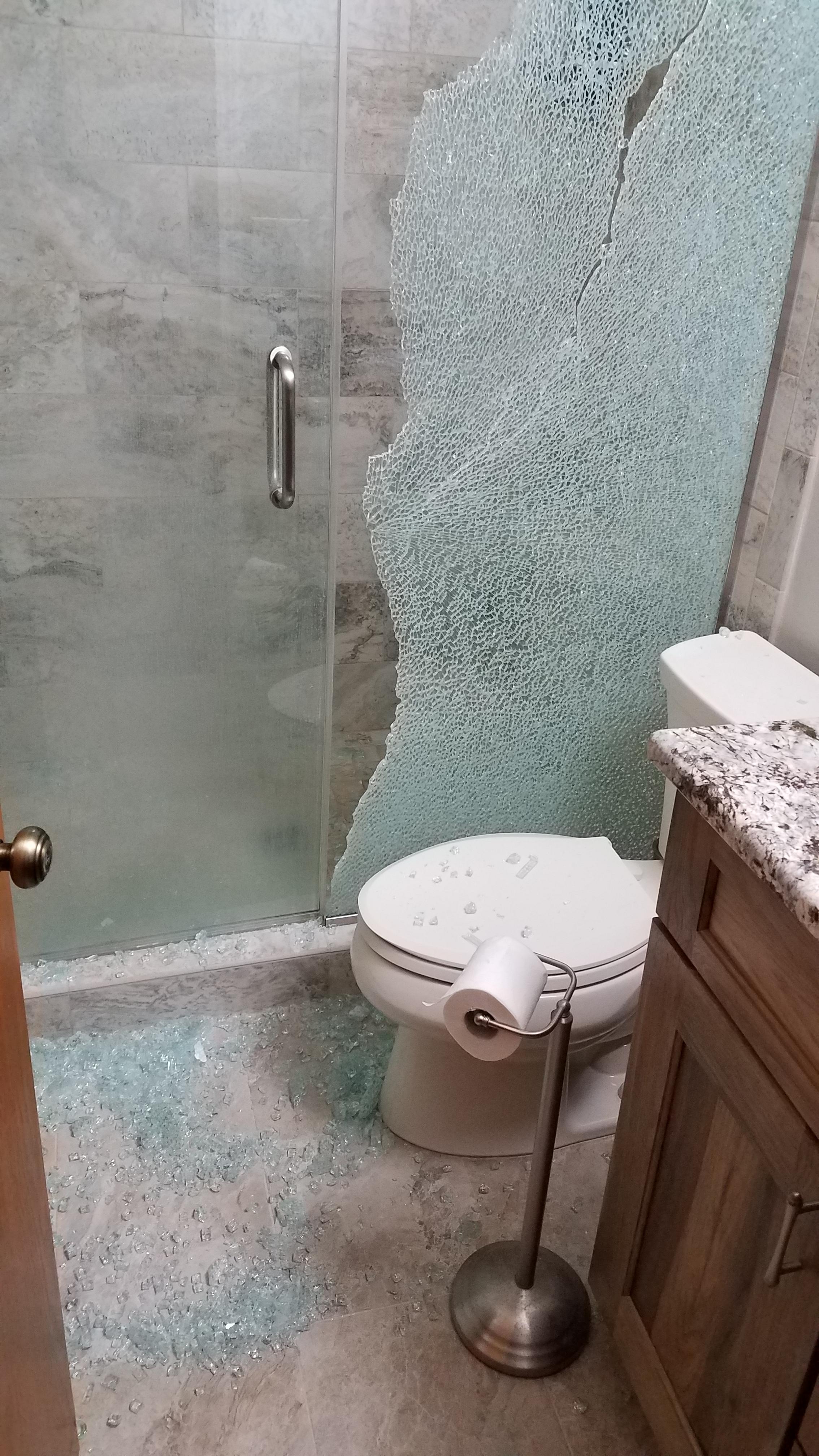 Shower wall gone wrong. Glass was not tempered correctly. Exploded