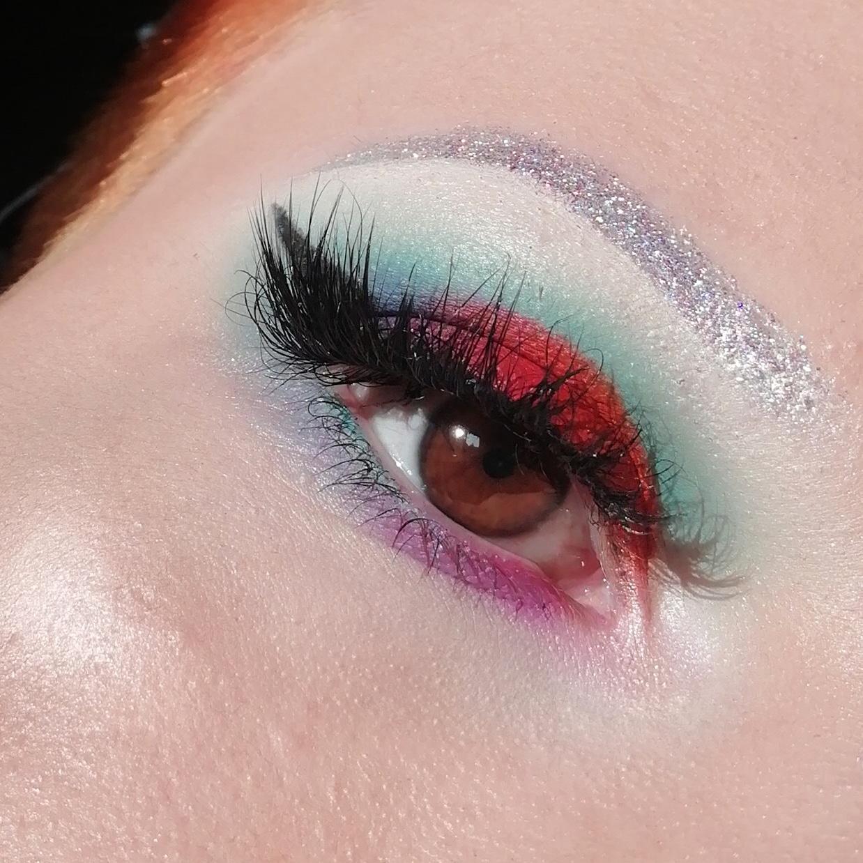 Glitter brow with a colourful cut crease r/MakeupAddiction