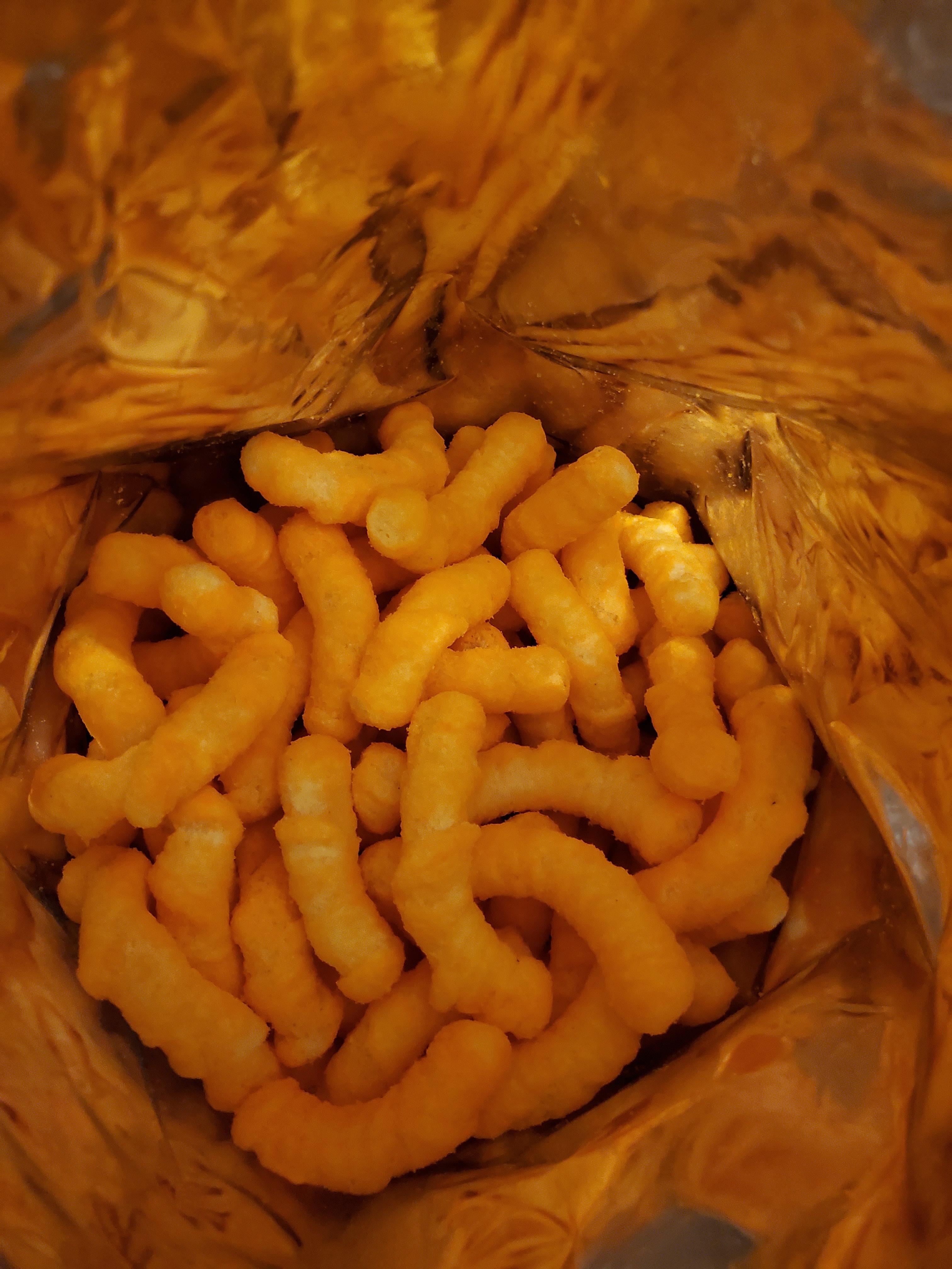 Can Dogs Have Cheetos Puffs