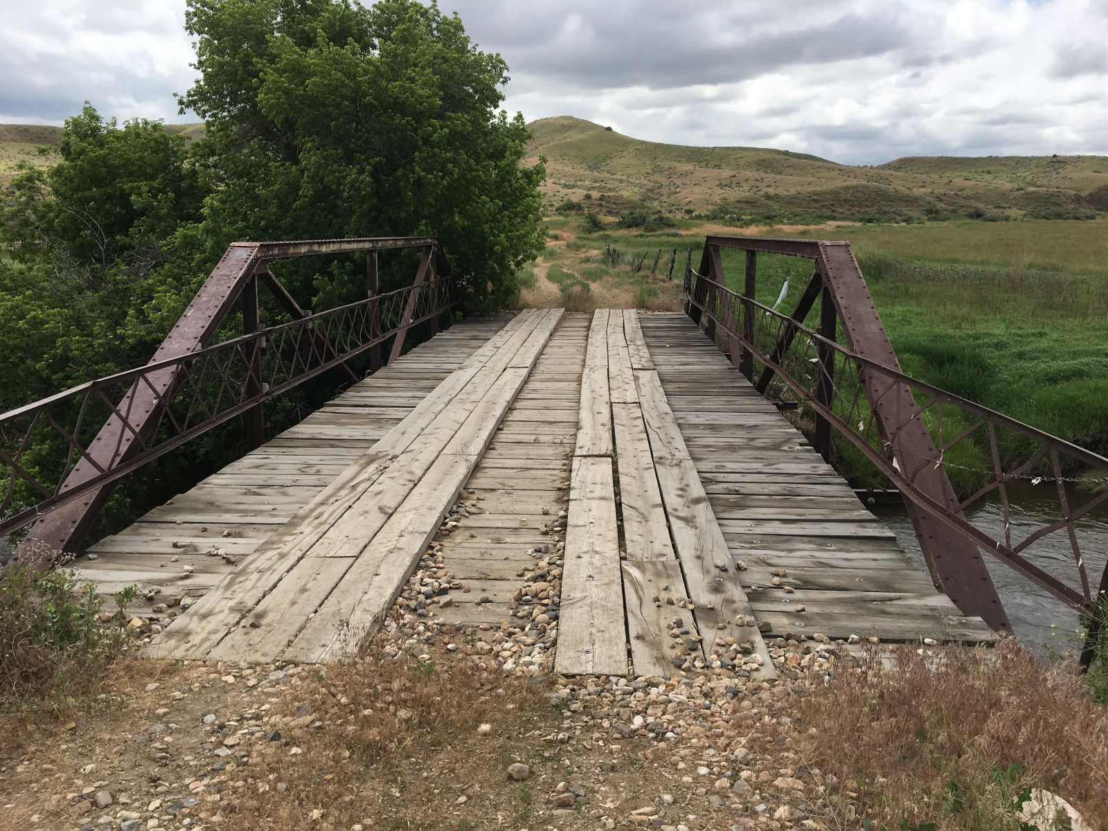 Well used bridge over the Nowood River near Ten Sleep, Wyoming, USA