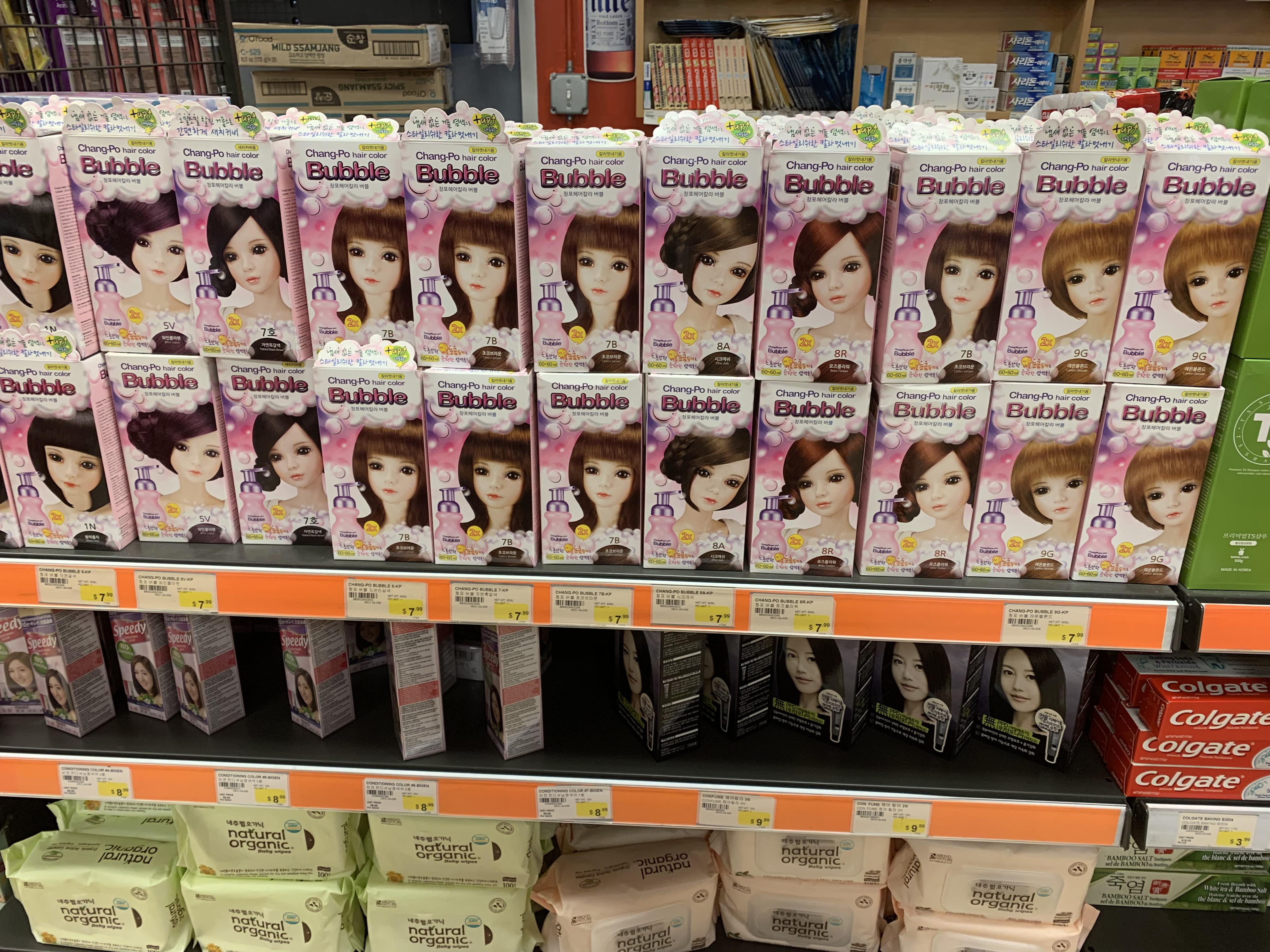 The hair dye boxes in Korean supermarket featuring dolls r