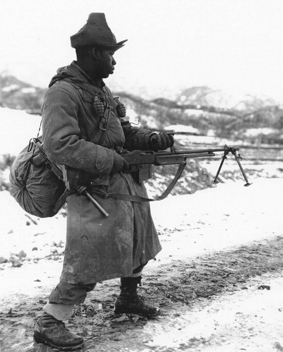 AfricanAmerican BAR Gunner with an M4 sidearm from the 25th Division in the Korean War (1951