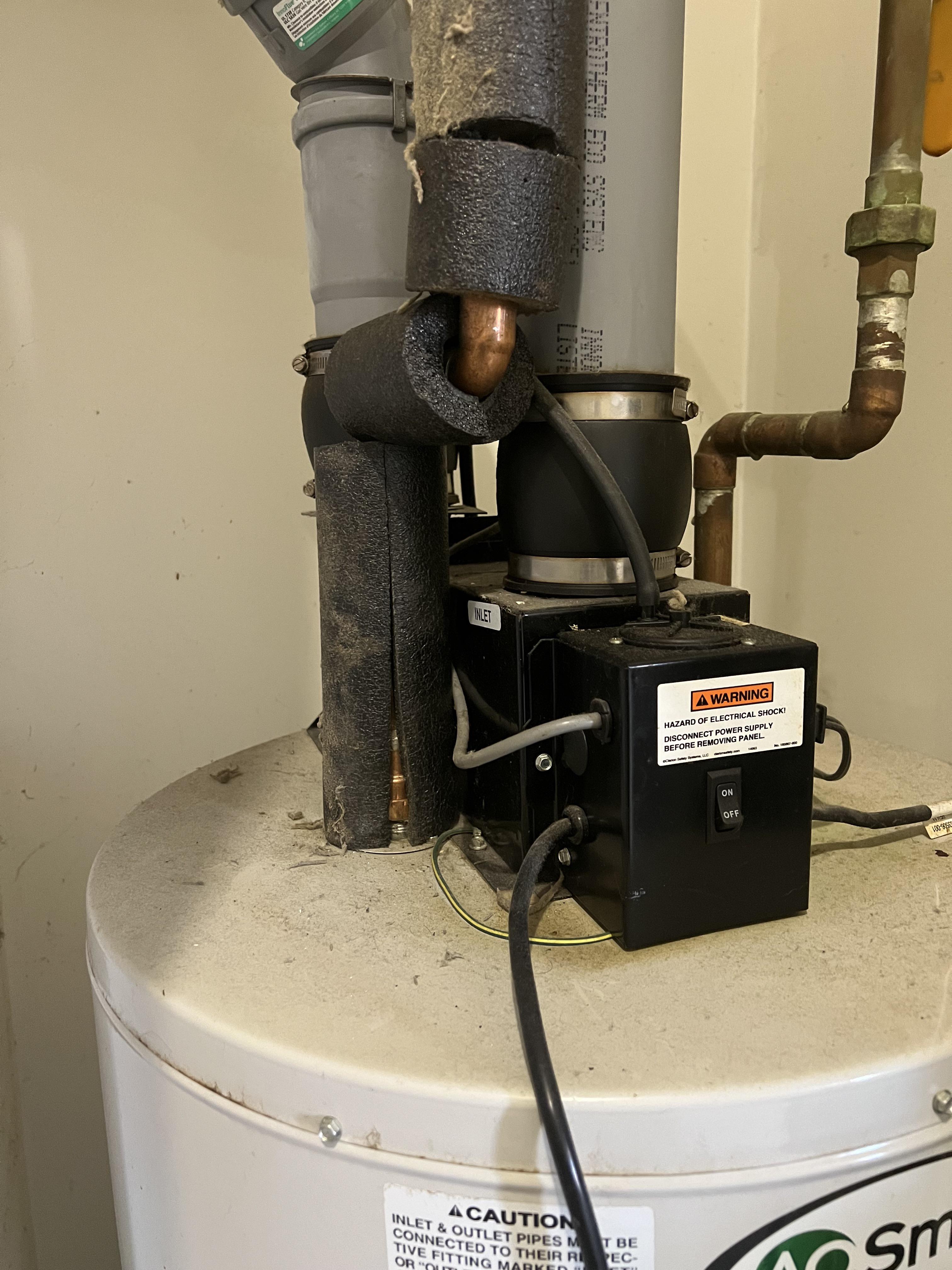 Is it safe to insulate with PE close to a power vent water heater? r