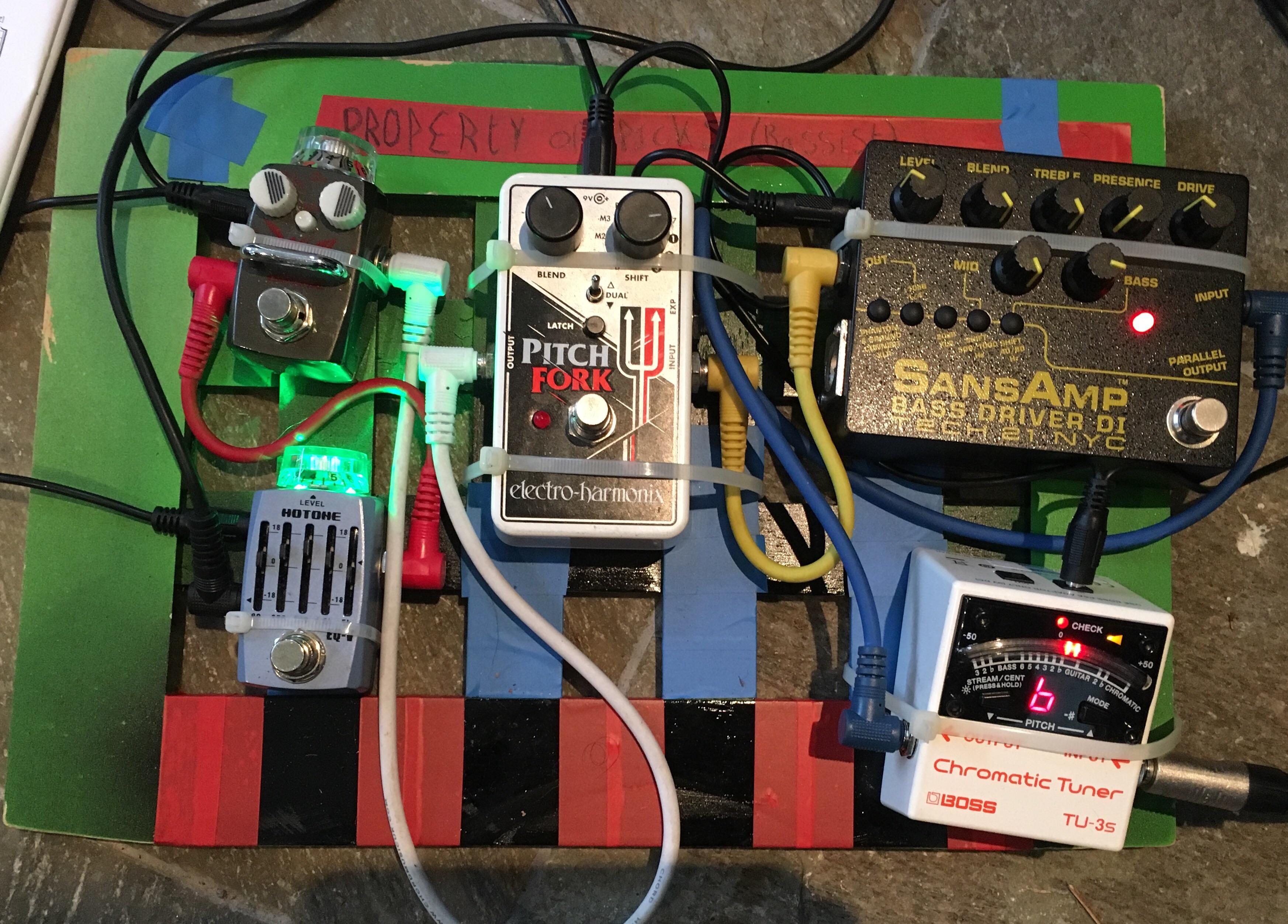 My bassist friend made his first pedalboard. He improvised r/guitarpedals