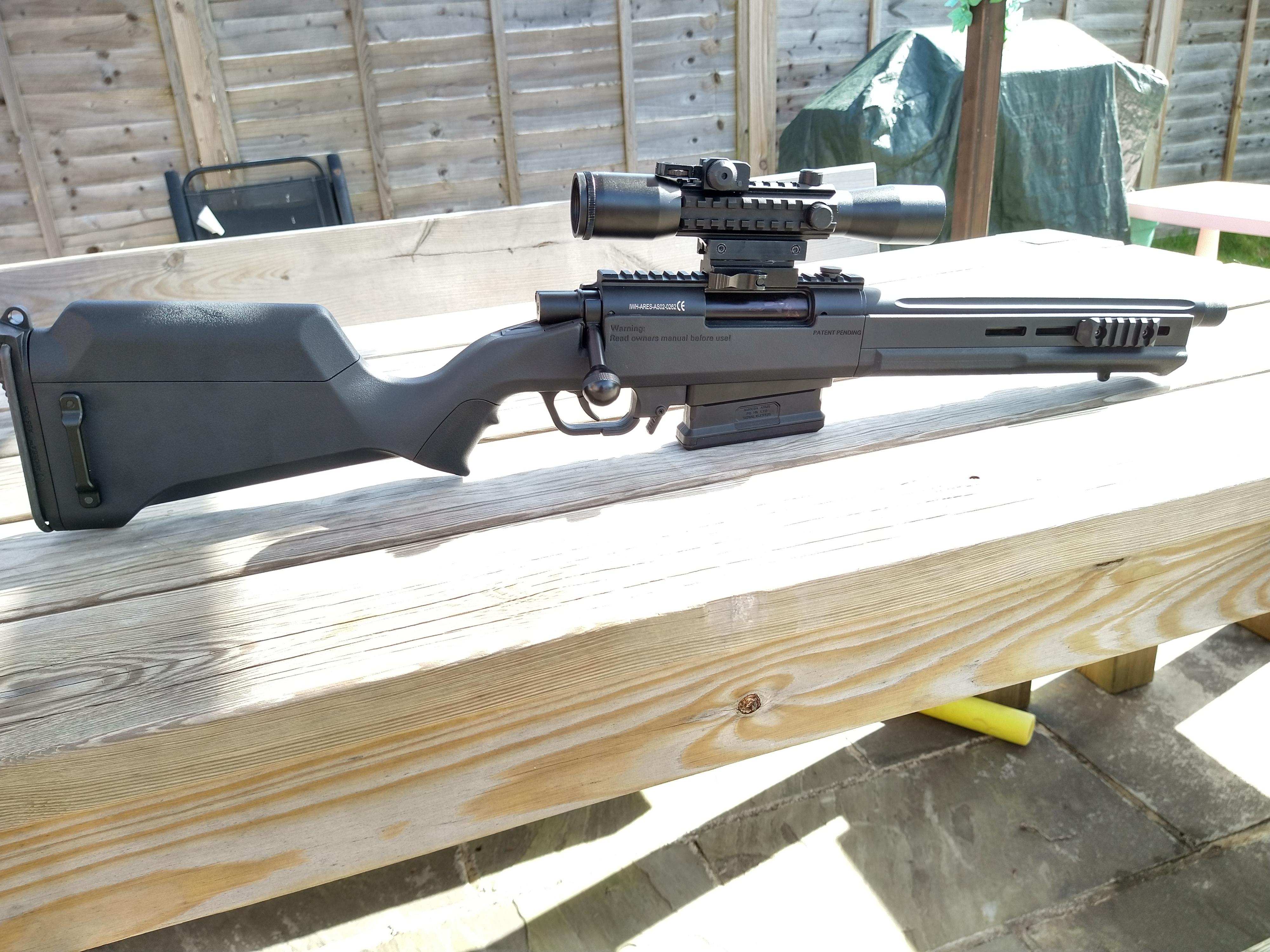 Ares AS02 Striker. Just firing a few shots in the garden as I can't