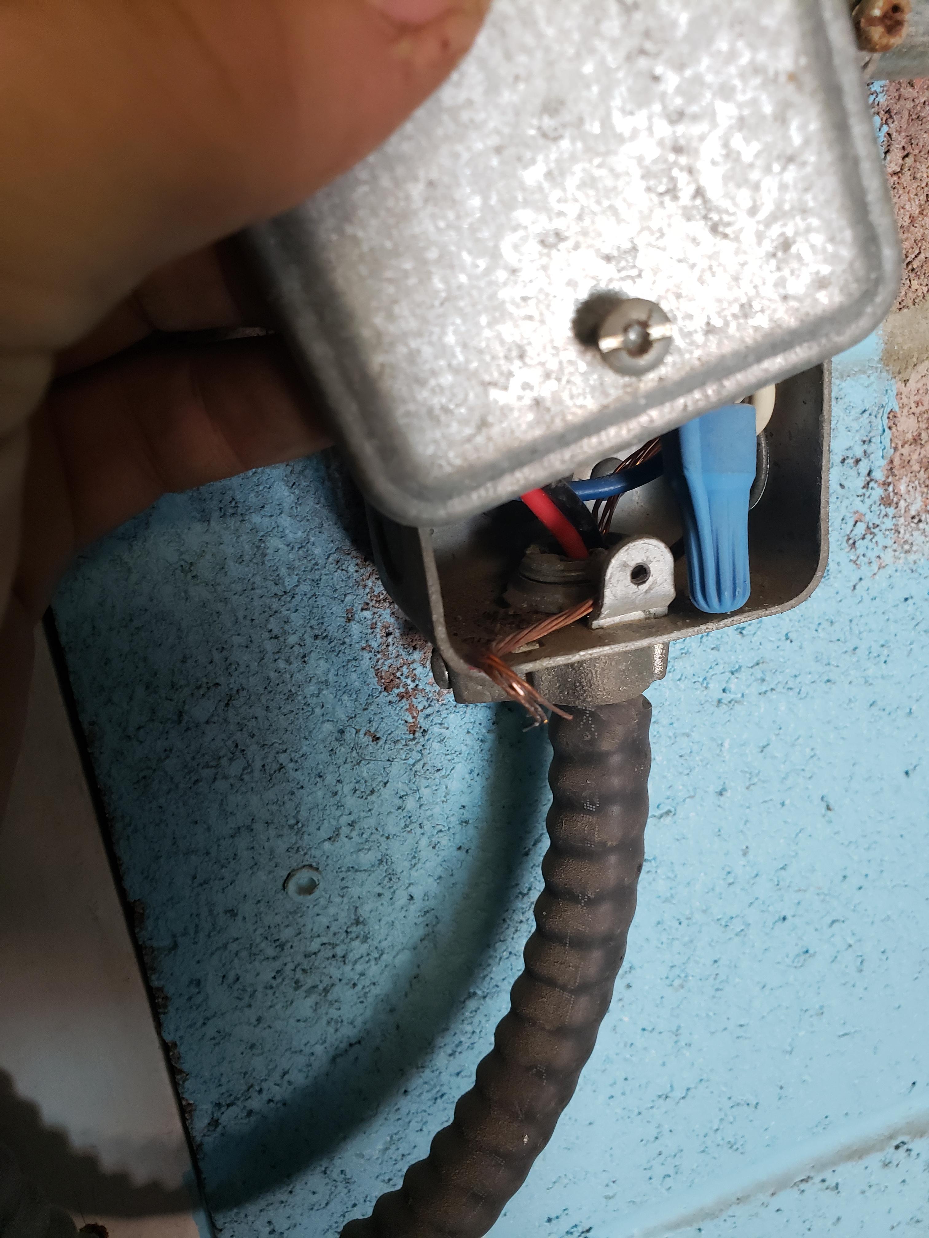 This ground wire was pinched between the plate and the box... r