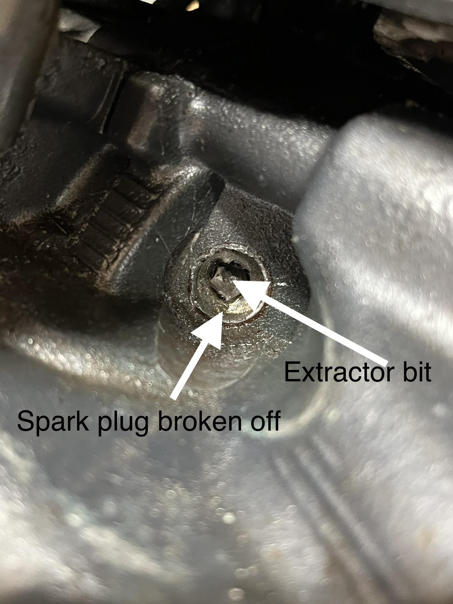 Spark plug broke off in engine, used extractor bit, and that broke in