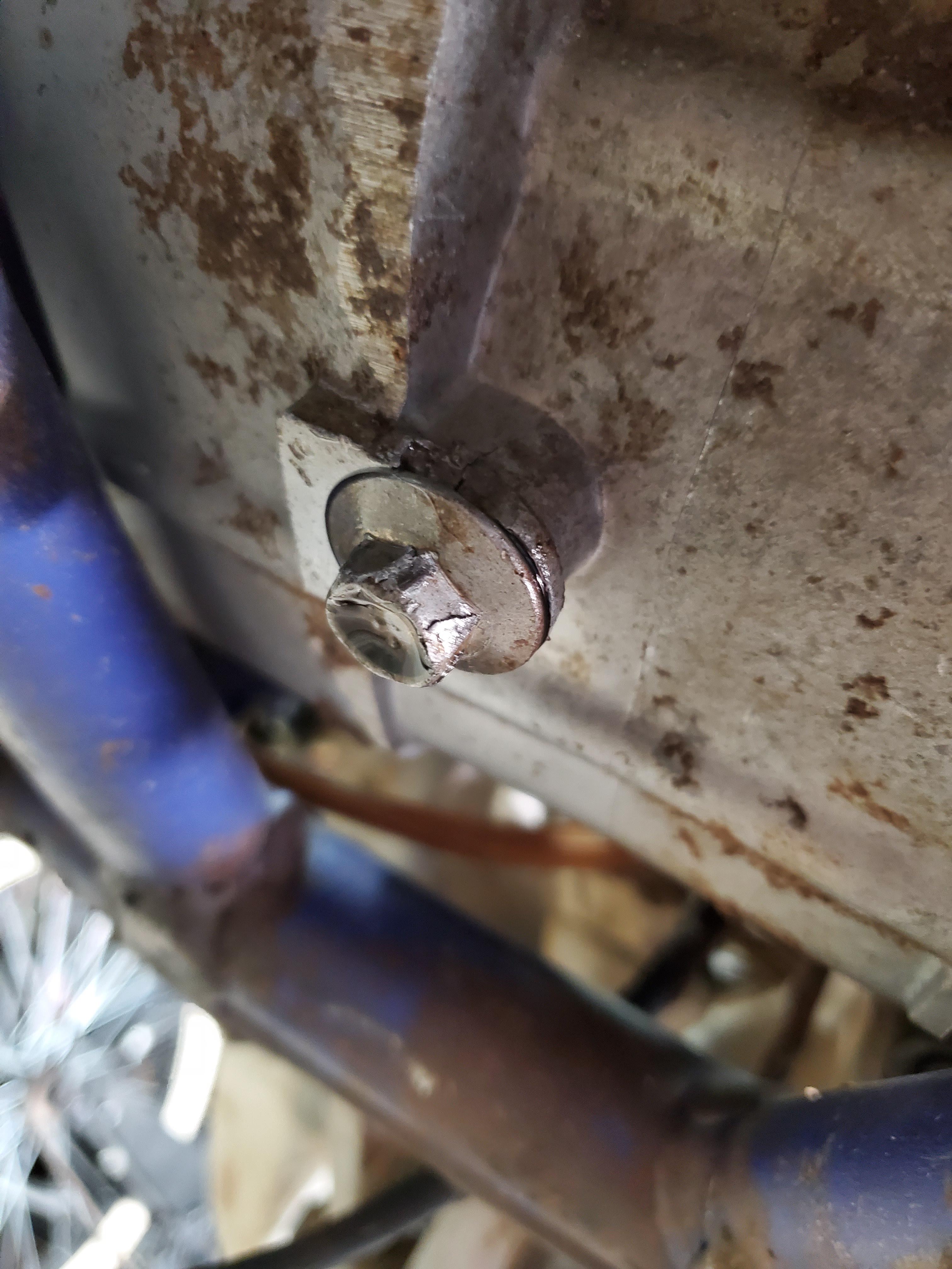 Just picked up this 2004 yz125 for dirt cheap found out why the oil drain plug is stripped and