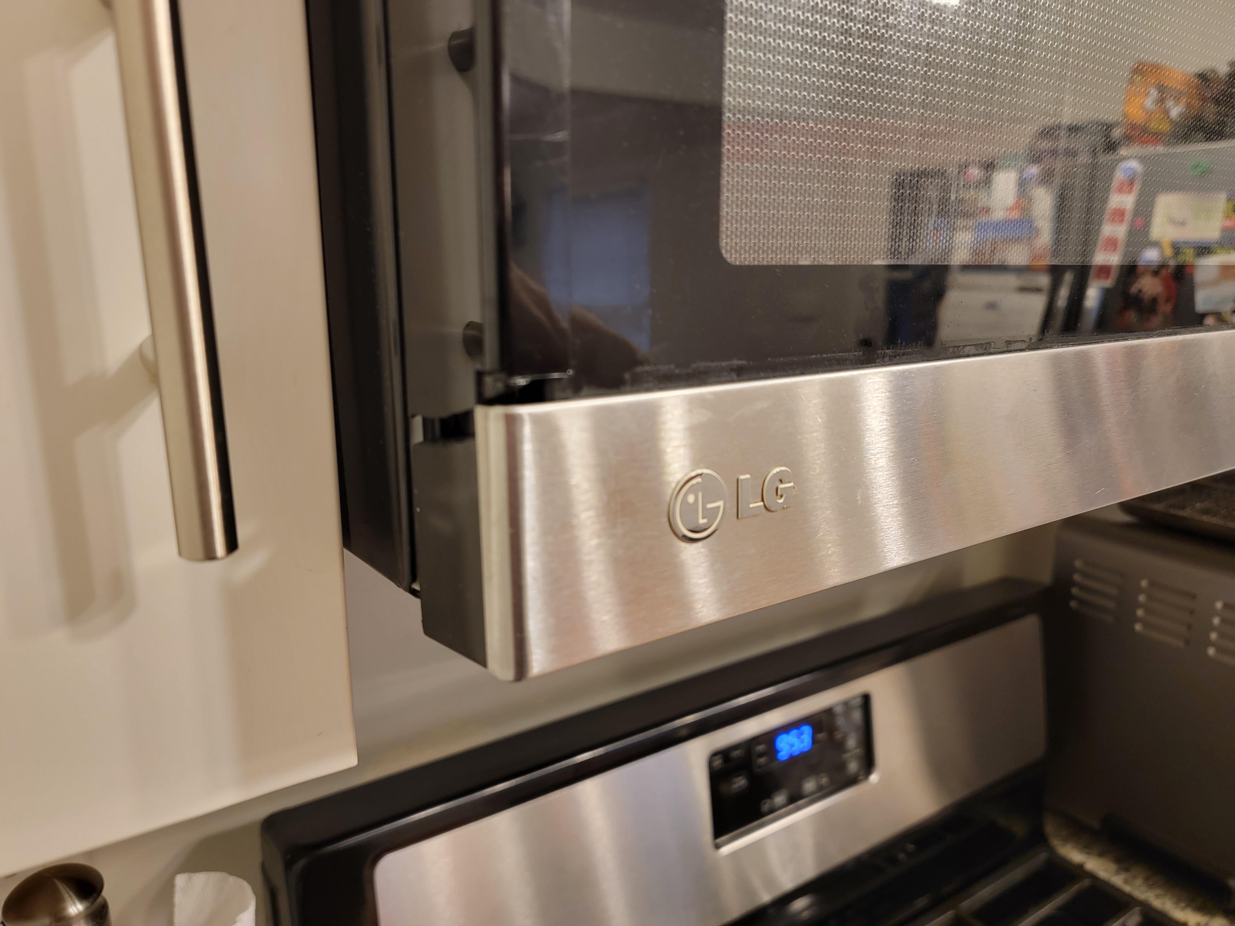 What's the right adhesive to fix this microwave door? See comments. r