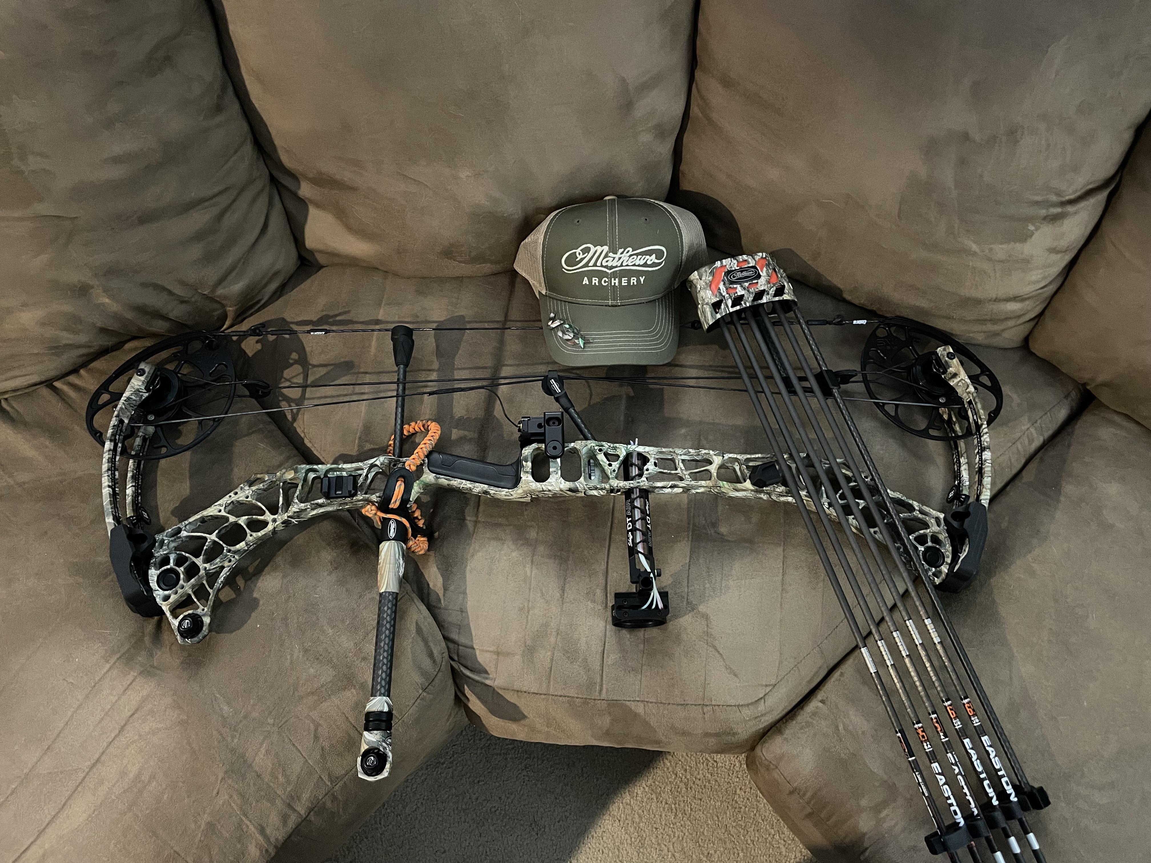 So I bought a new hat a while back and got a free hunting bow. Mathews