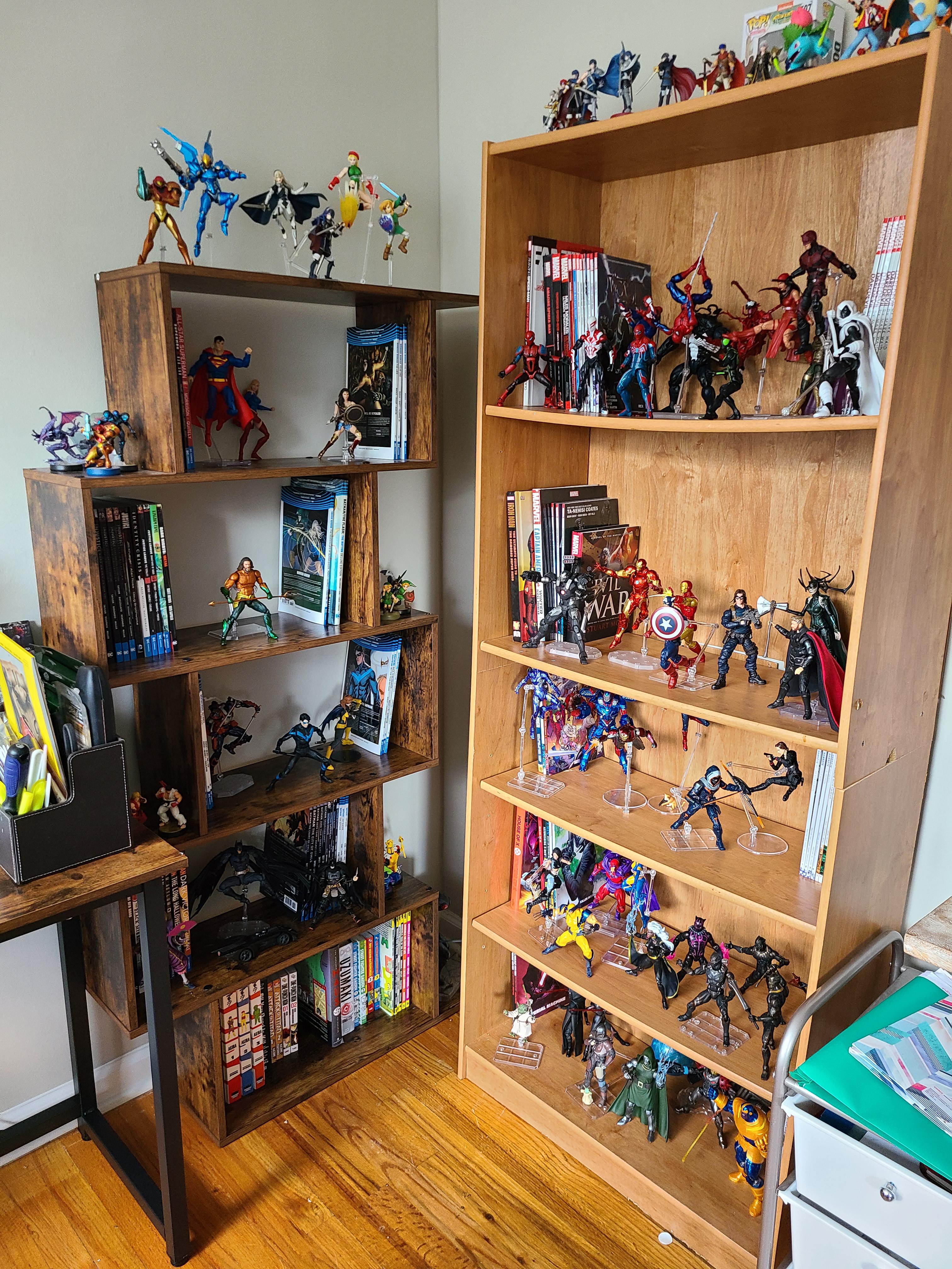 My bookshelves featuring my collection of graphic novels and matching