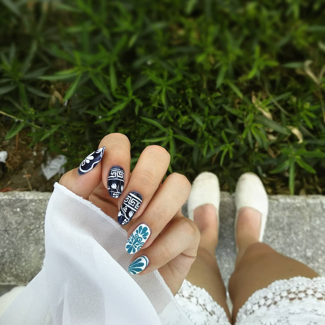 Freehand greek nails from my last trip to Corfu r/RedditLaqueristas