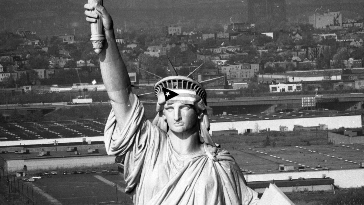 The Puerto Rico flag on the Statue of Liberty in New York, NY, on