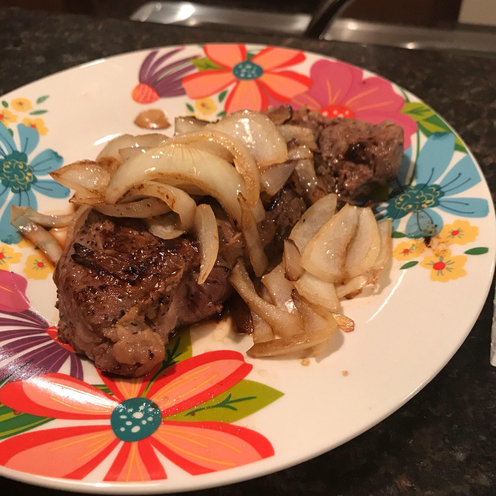 Panseared New York Strip with sautéed onions and garlic r/steak