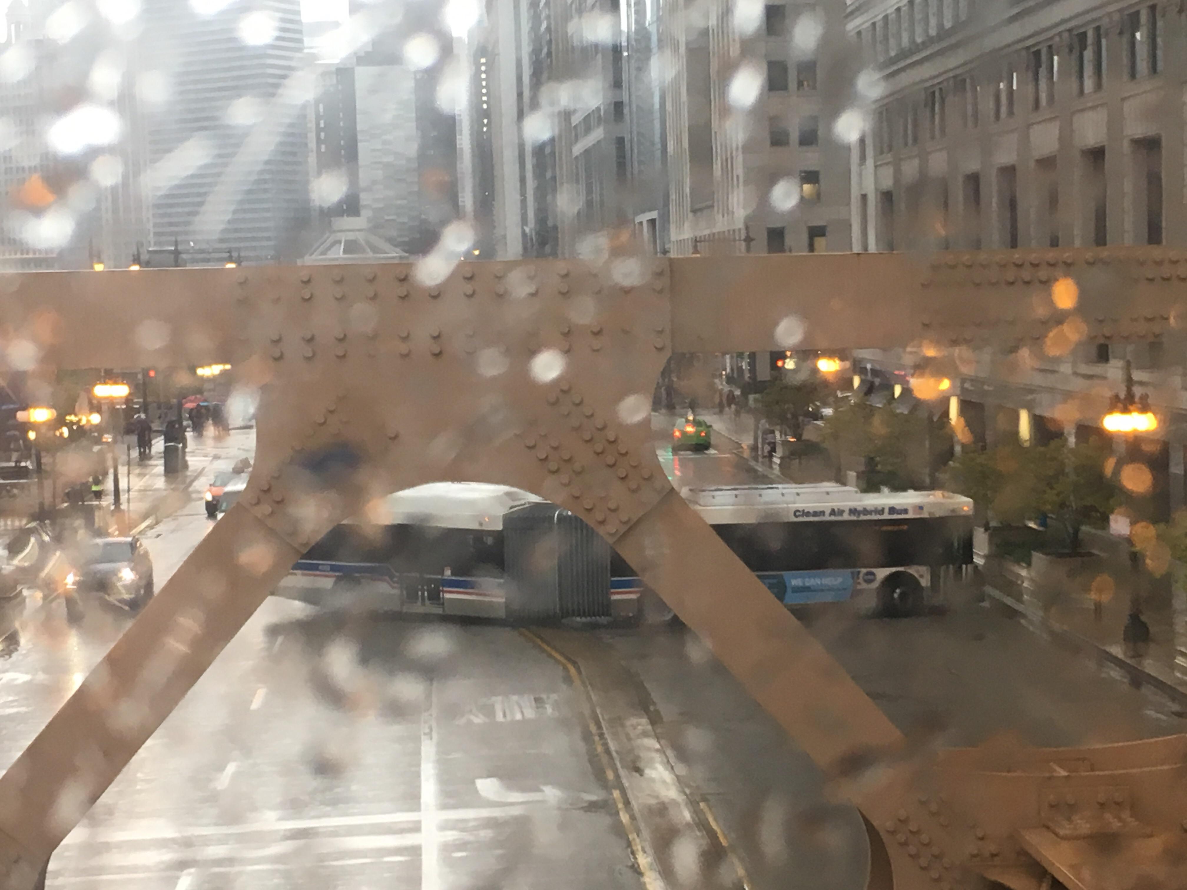Long bus attempting to pull a Uturn on Wacker this