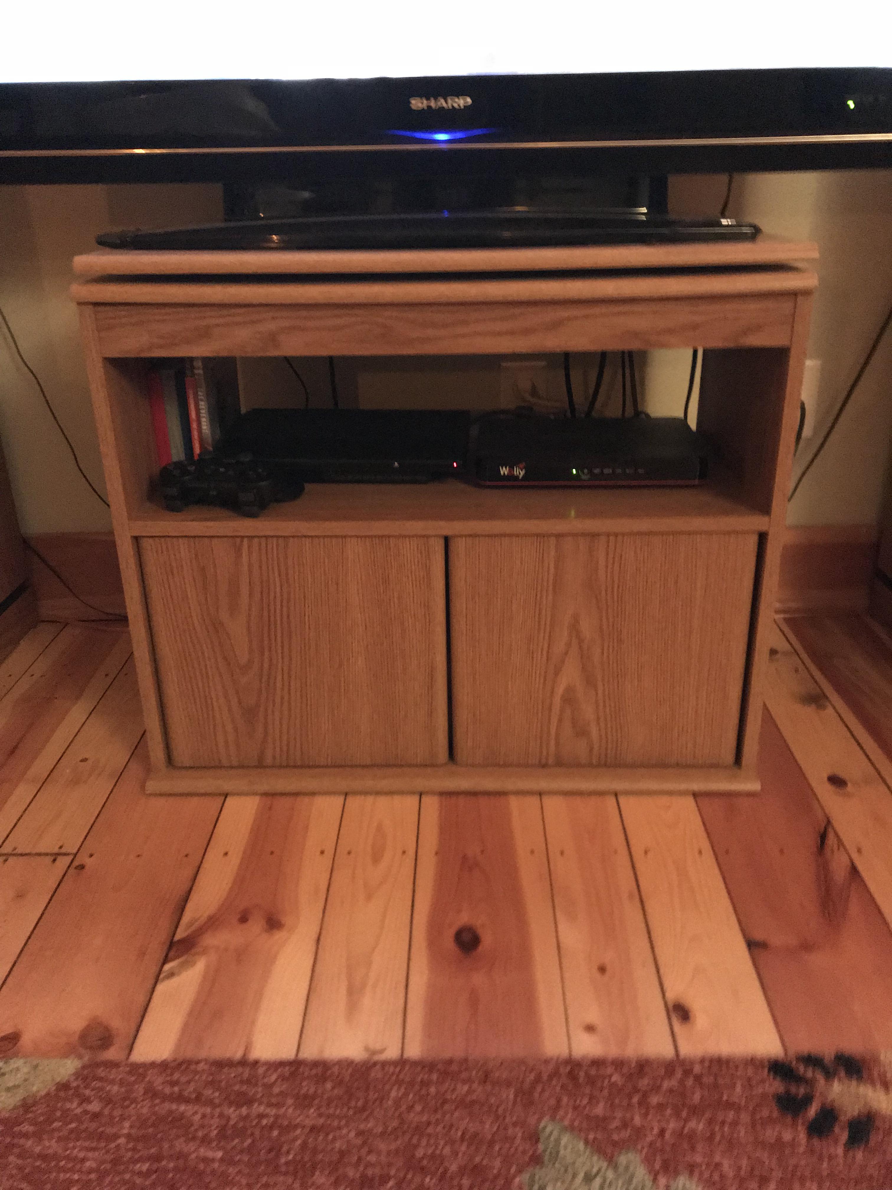 This wooden TV stand from the 90’s that everyone and their mother