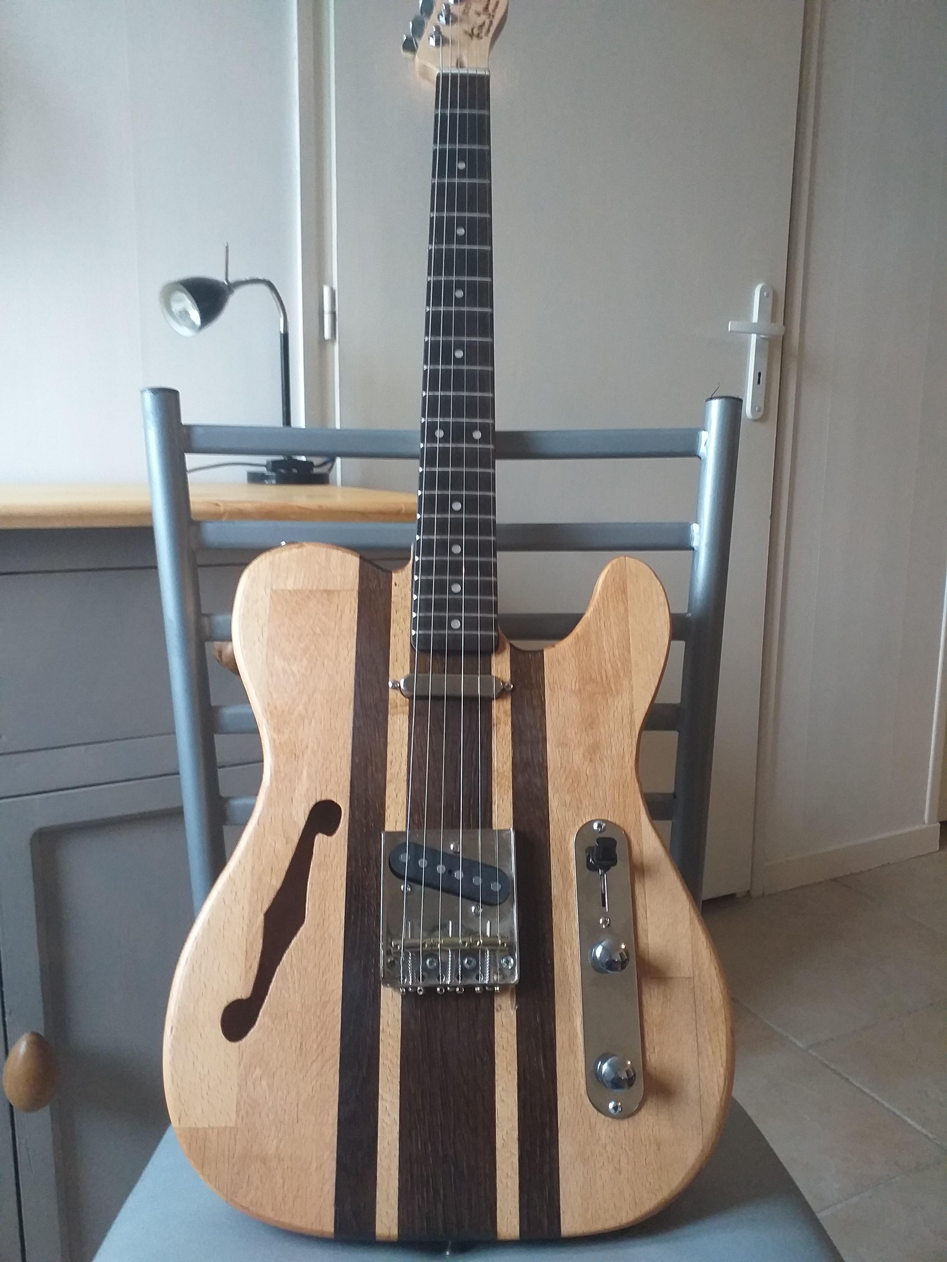 My homemade Beech guitar, "The TIMOCASTER". Made from the floorboards
