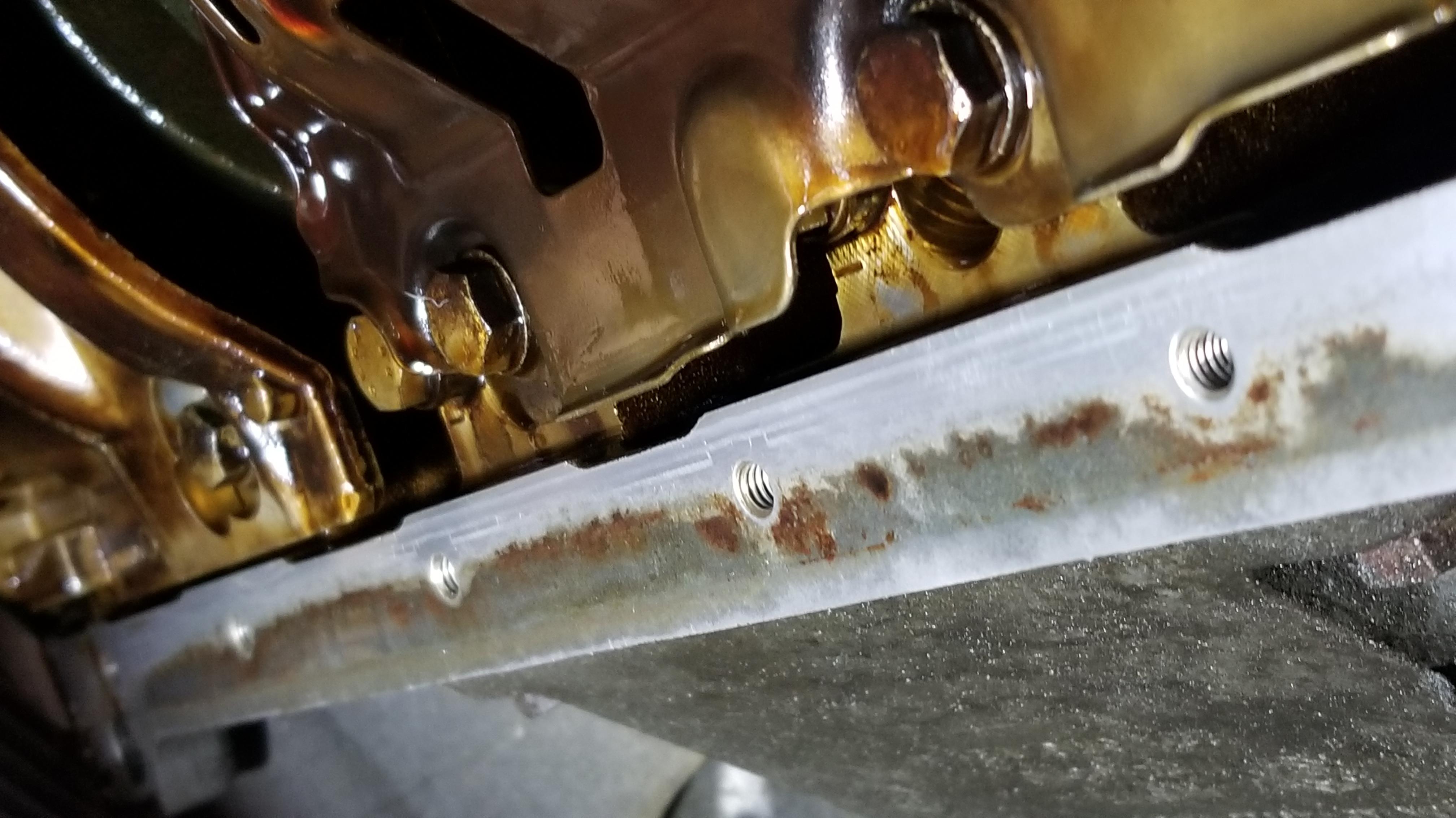 replacing oil pan gasket M54B25. Is this corrosion something to be