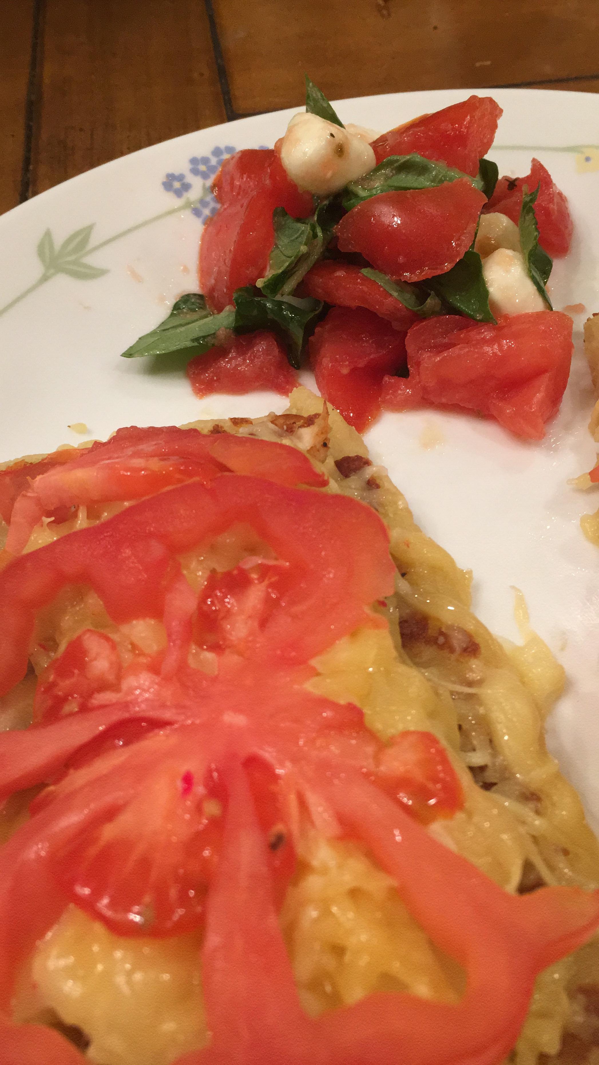 Keto flatbread, Italianspiced chicken, provolone, gouda, and heirloom