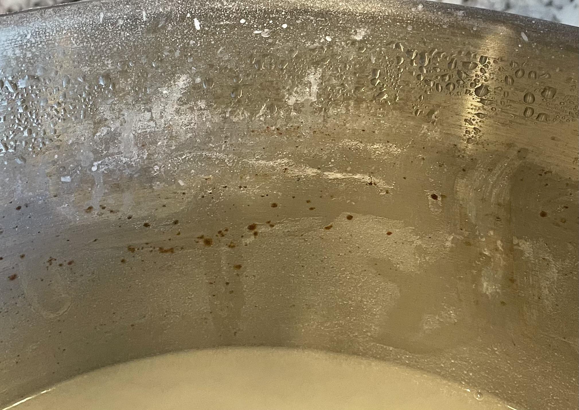 Brown spots on stainless steel pot after boiling water for a long time