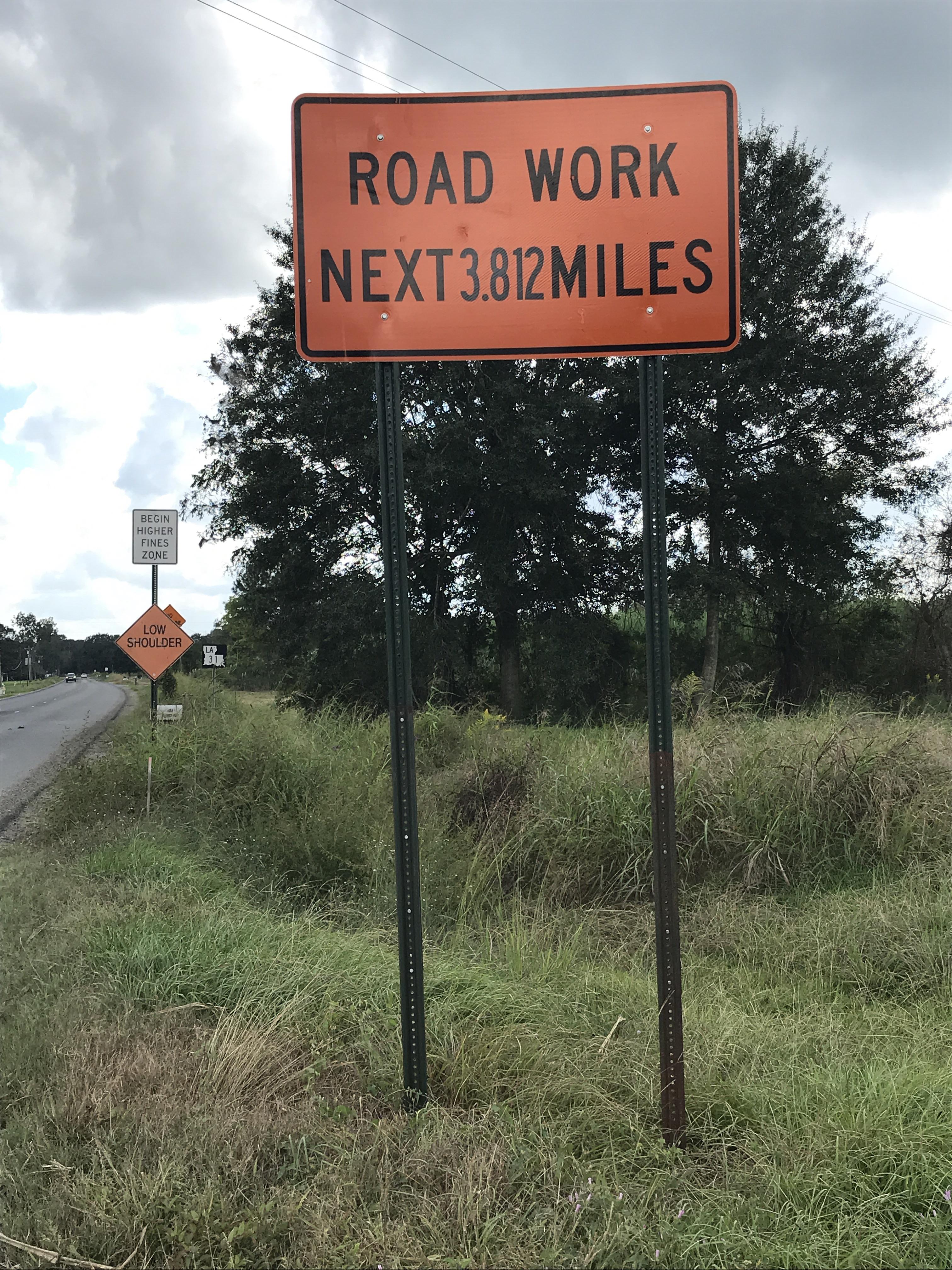 This Insanely Precise Road Sign (near Breaux Bridge, LA) r