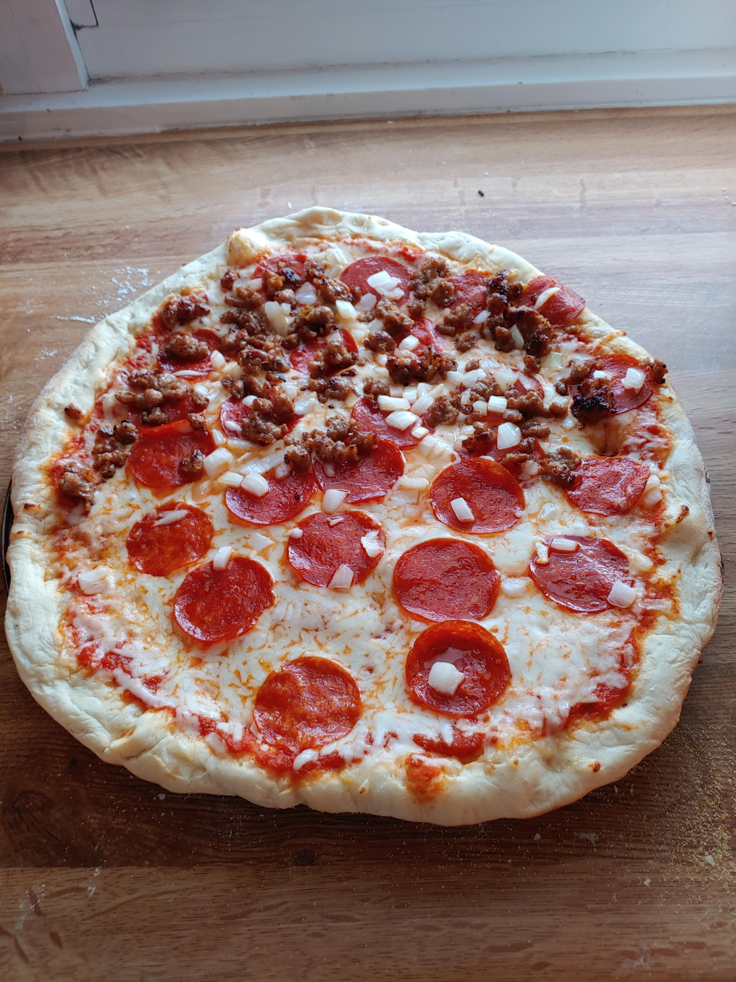 First attempt. Crust didn't rise like I would have liked, but it was still delicious! r/Pizza