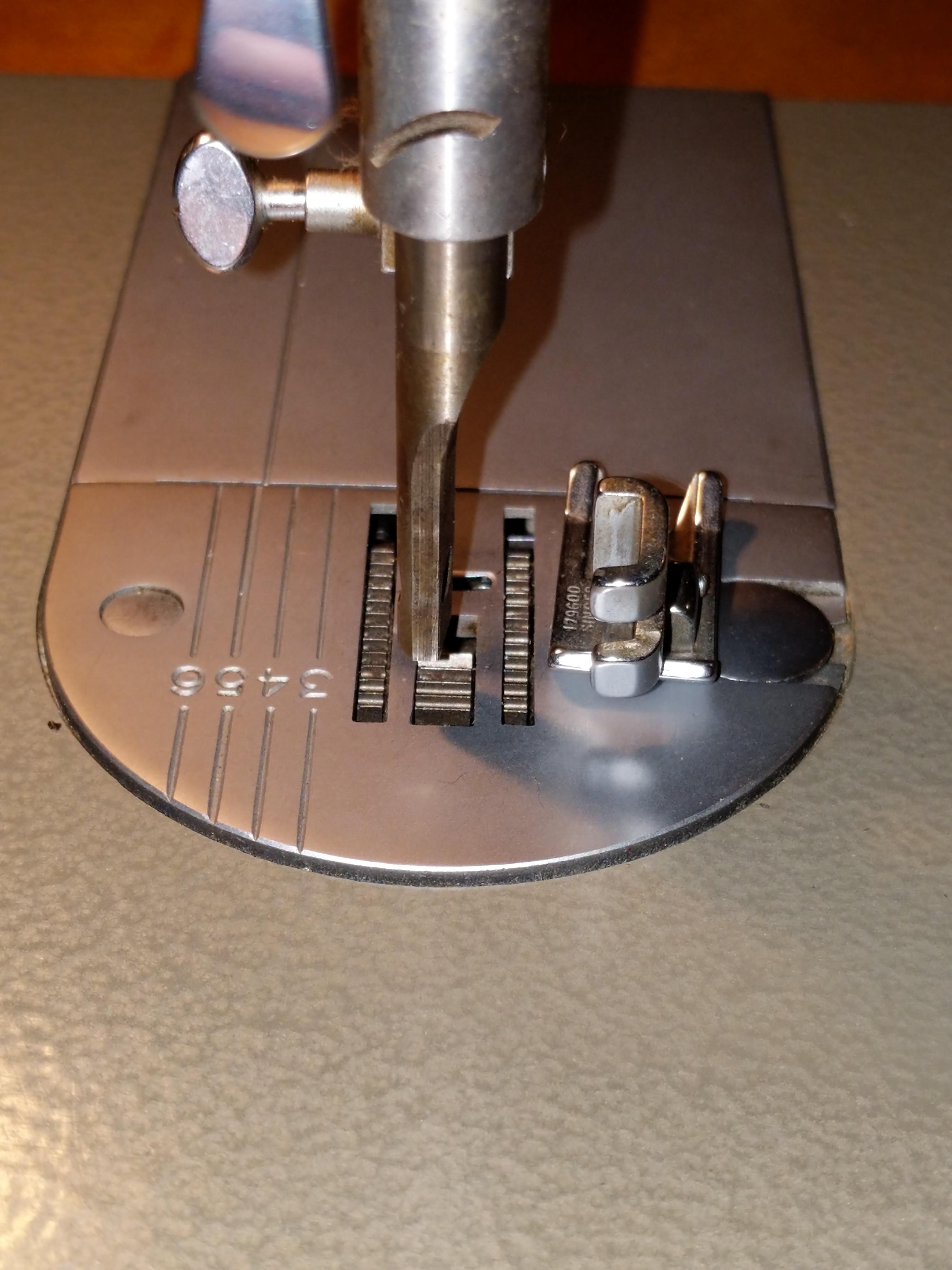 Crooked part holding presser foot? r/sewing