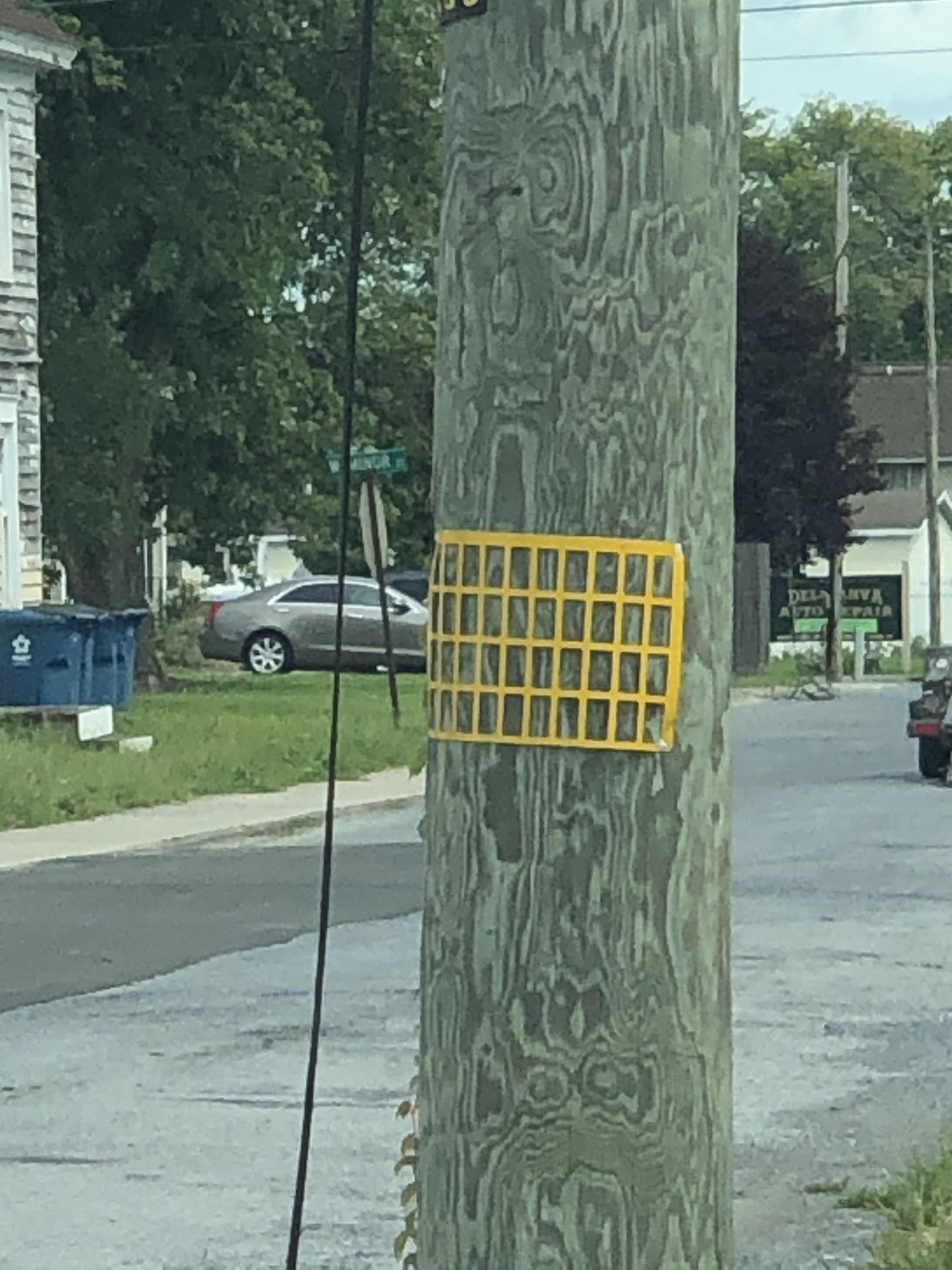WITT Yellow grid on wood telephone pole, seen it in two different US